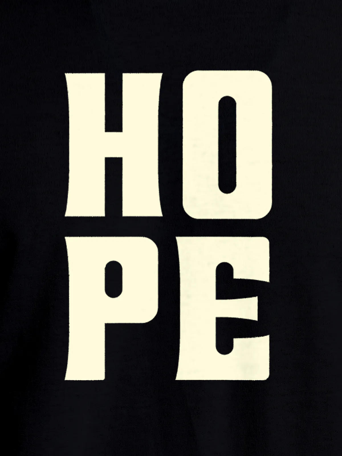 Close up of 'Hope' design on Men's Black Round Neck T-shirt, highlighting intricate details and vibrant print.