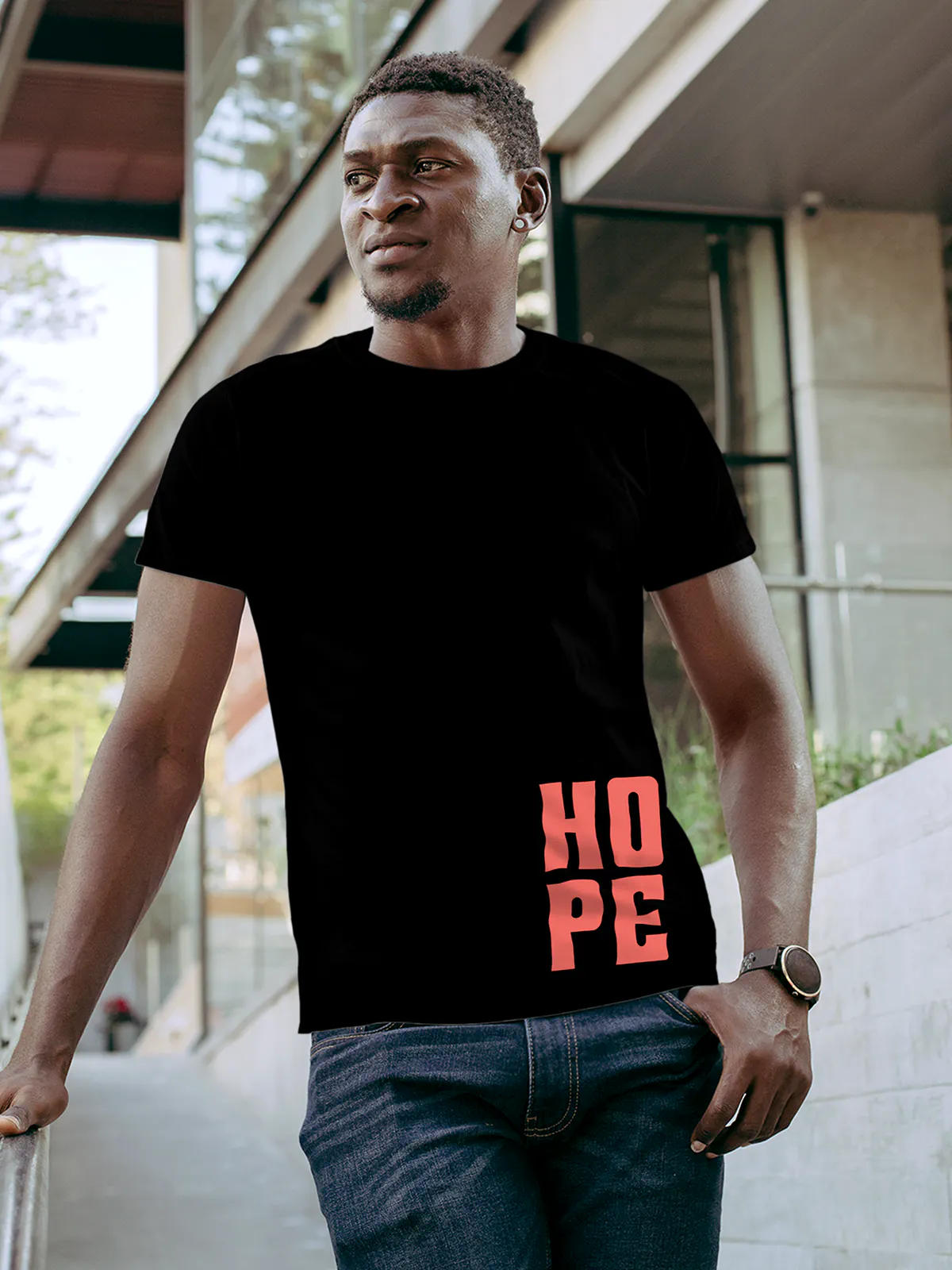 Model wearing Men's Black Round Neck T-shirt with 'Hope' design, offering effortless style and premium comfort