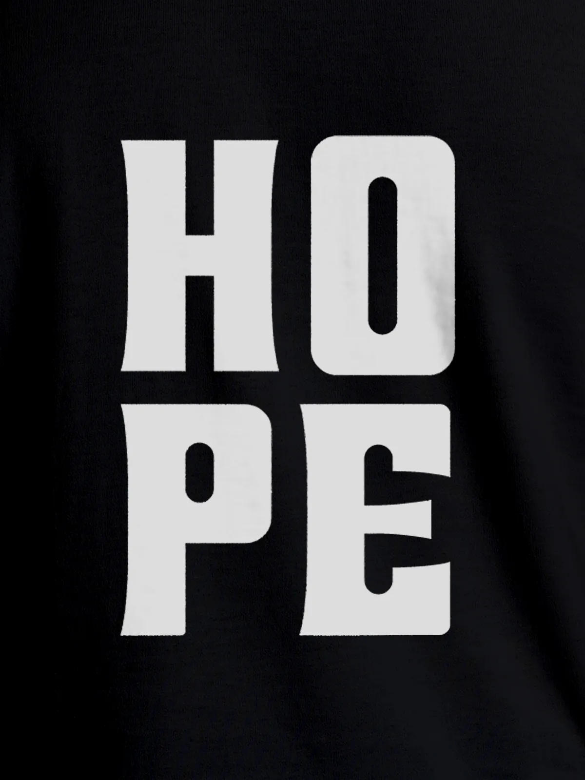 Close up of 'Hope' design on Women's Black Round Neck T-shirt, highlighting intricate details and vibrant print.