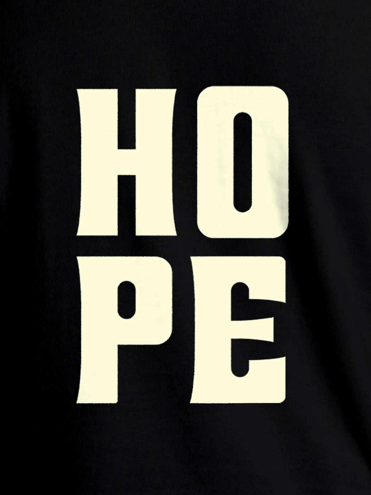 Close up of 'Hope' design on Women's Black Round Neck T-shirt, highlighting intricate details and vibrant print.