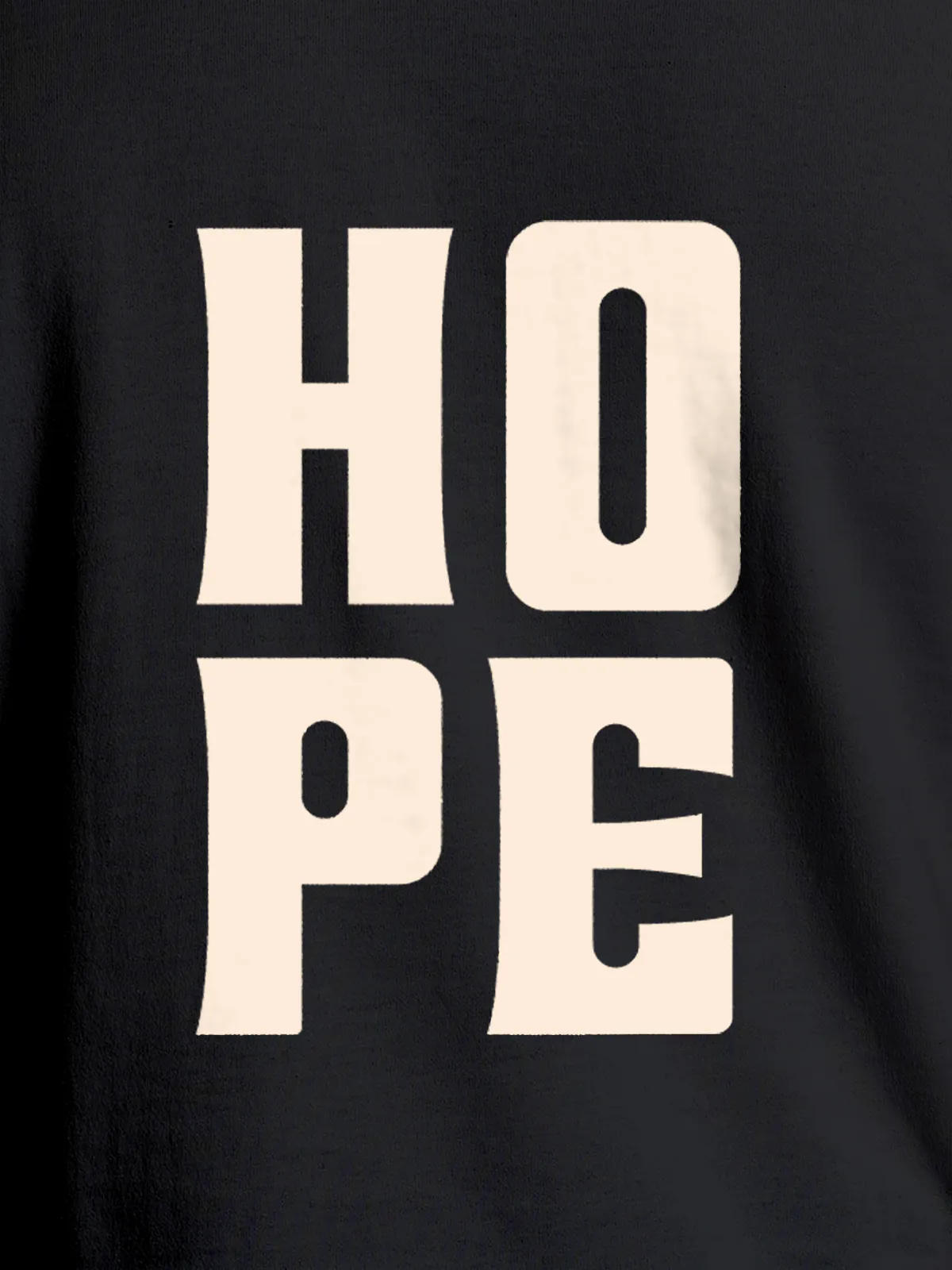 Close up of 'Hope' design on Women's Dark Grey Round Neck T-shirt, highlighting intricate details and vibrant print.