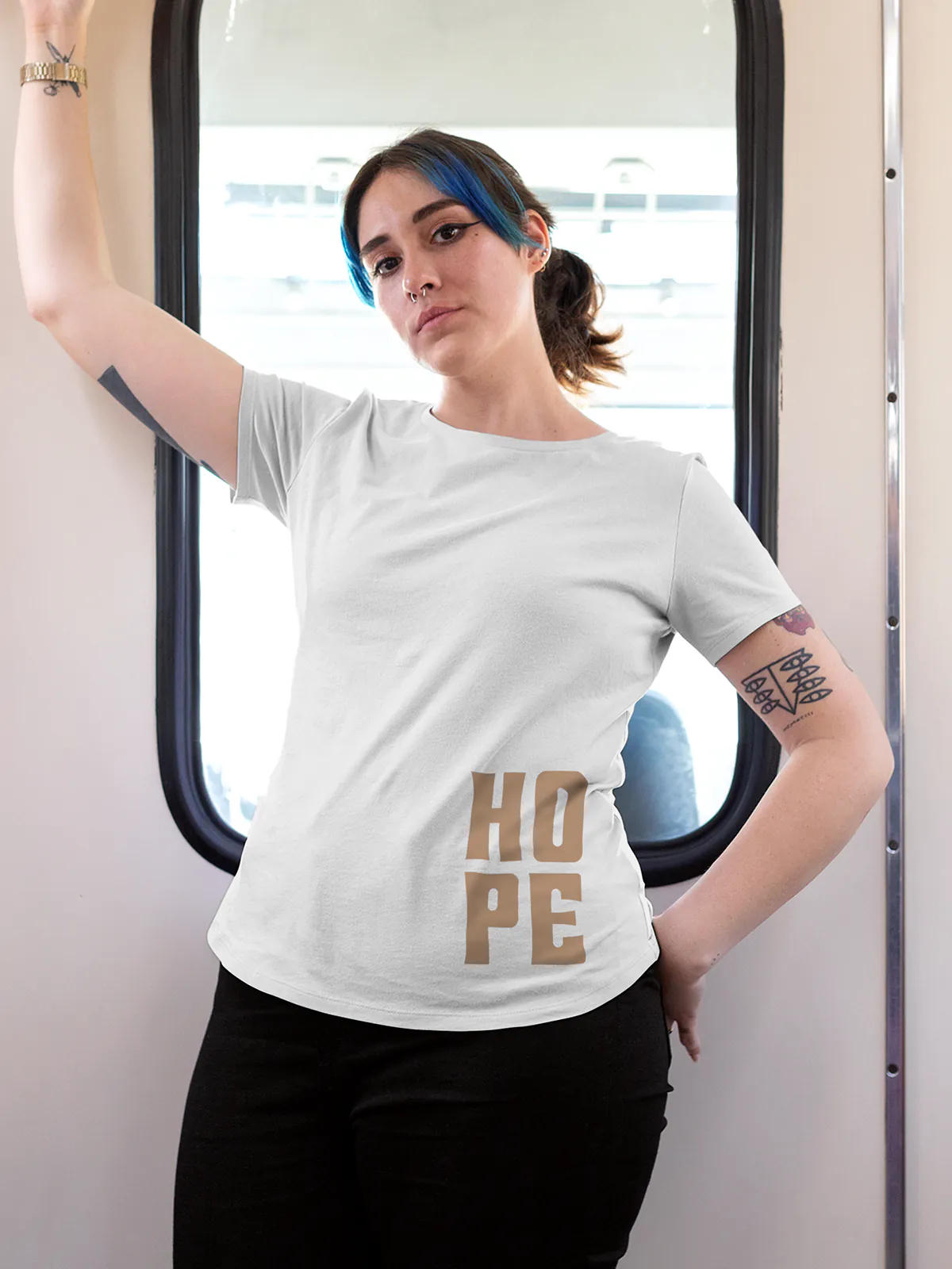 Model wearing Women's White Round Neck T-shirt with 'Hope' design, offering effortless style and premium comfort