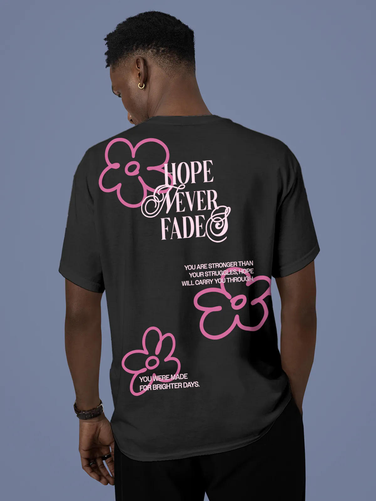 Model wearing Men's Dark Grey Round Neck T-shirt with 'Hope Never Fades' design, offering effortless style and premium comfort