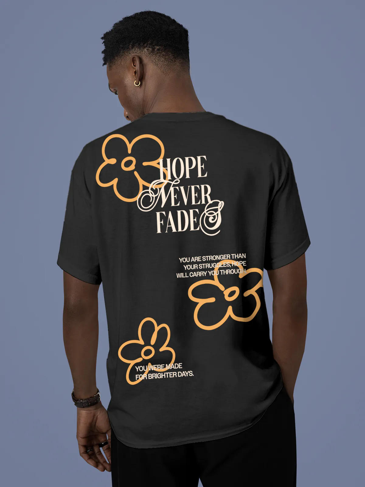 Model wearing Men's Dark Grey Round Neck T-shirt with 'Hope Never Fades' design, offering effortless style and premium comfort