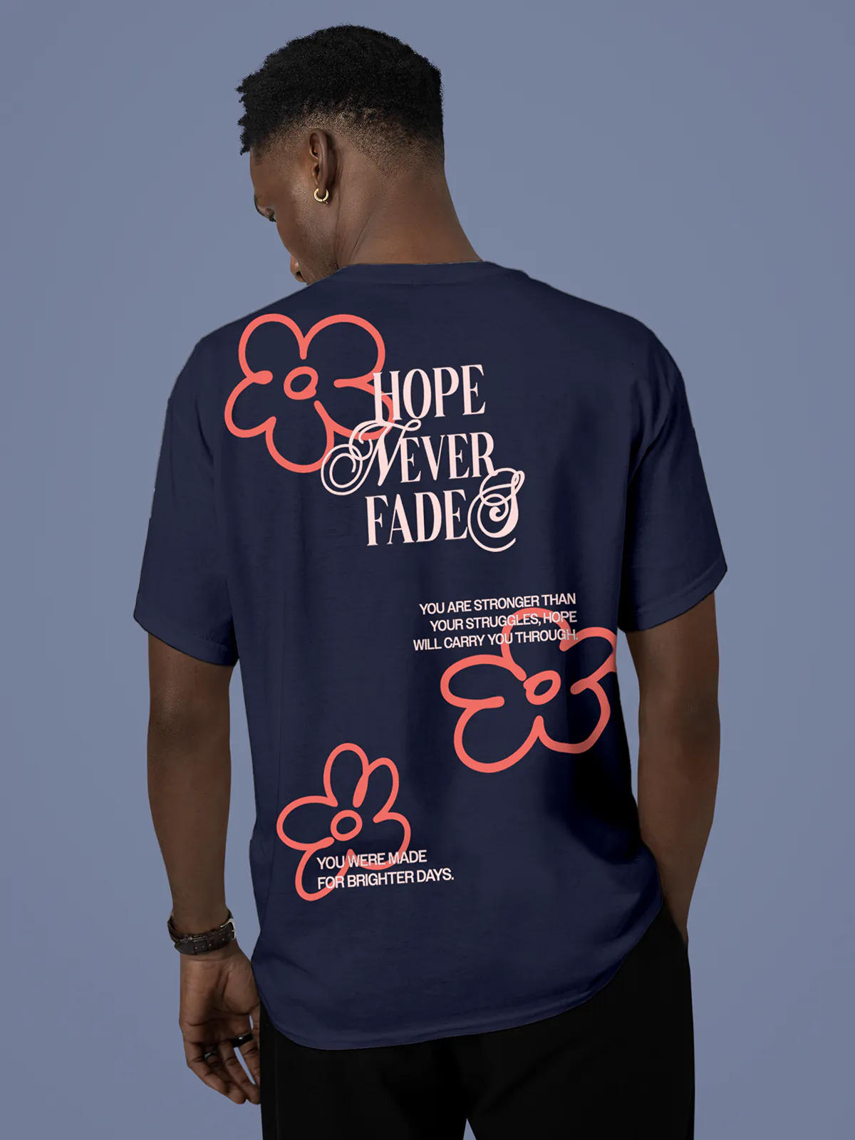 Model wearing Men's Navy Blue Round Neck T-shirt with 'Hope Never Fades' design, offering effortless style and premium comfort