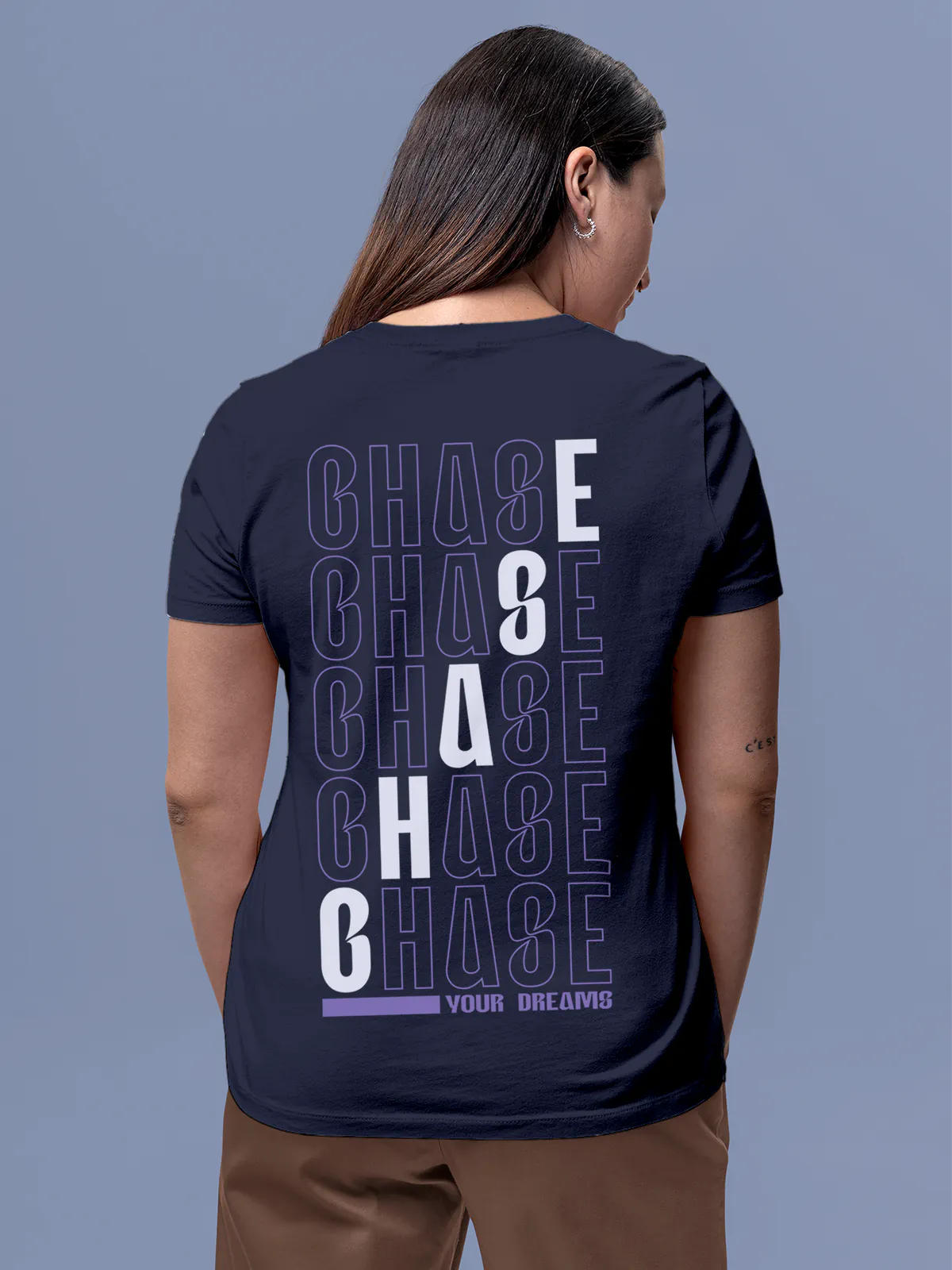 Model wearing Women's Navy Blue Round Neck T-shirt with 'Chase Your Dreams' design, offering effortless style and premium comfort