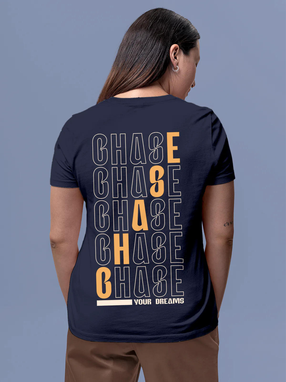 Model wearing Women's Navy Blue Round Neck T-shirt with 'Chase Your Dreams' design, offering effortless style and premium comfort