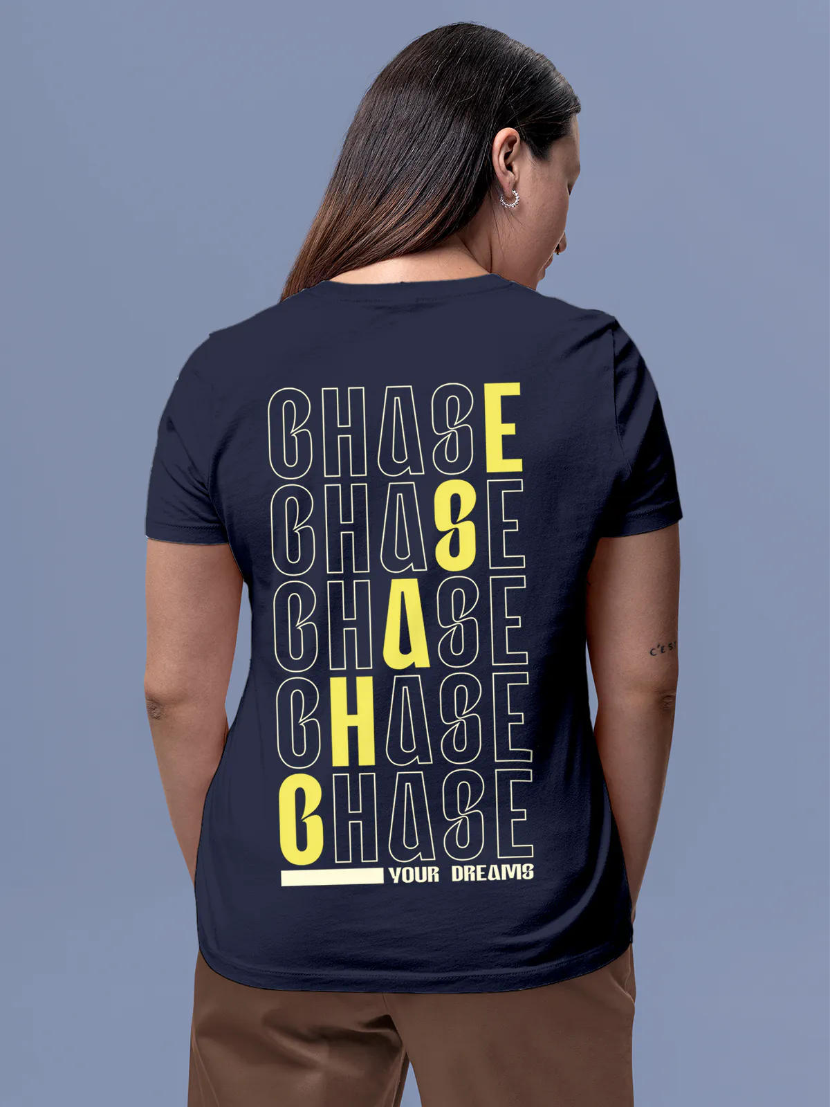 Model wearing Women's Navy Blue Round Neck T-shirt with 'Chase Your Dreams' design, offering effortless style and premium comfort