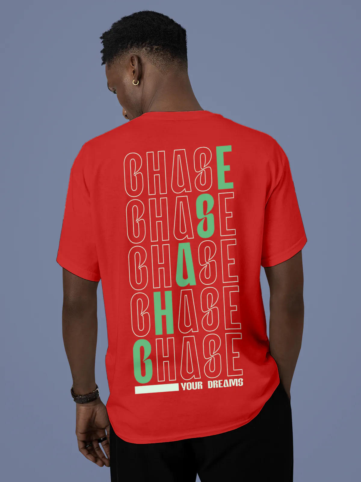 Model wearing Men's Red Round Neck T-shirt with 'Chase Your Dreams' design, offering effortless style and premium comfort