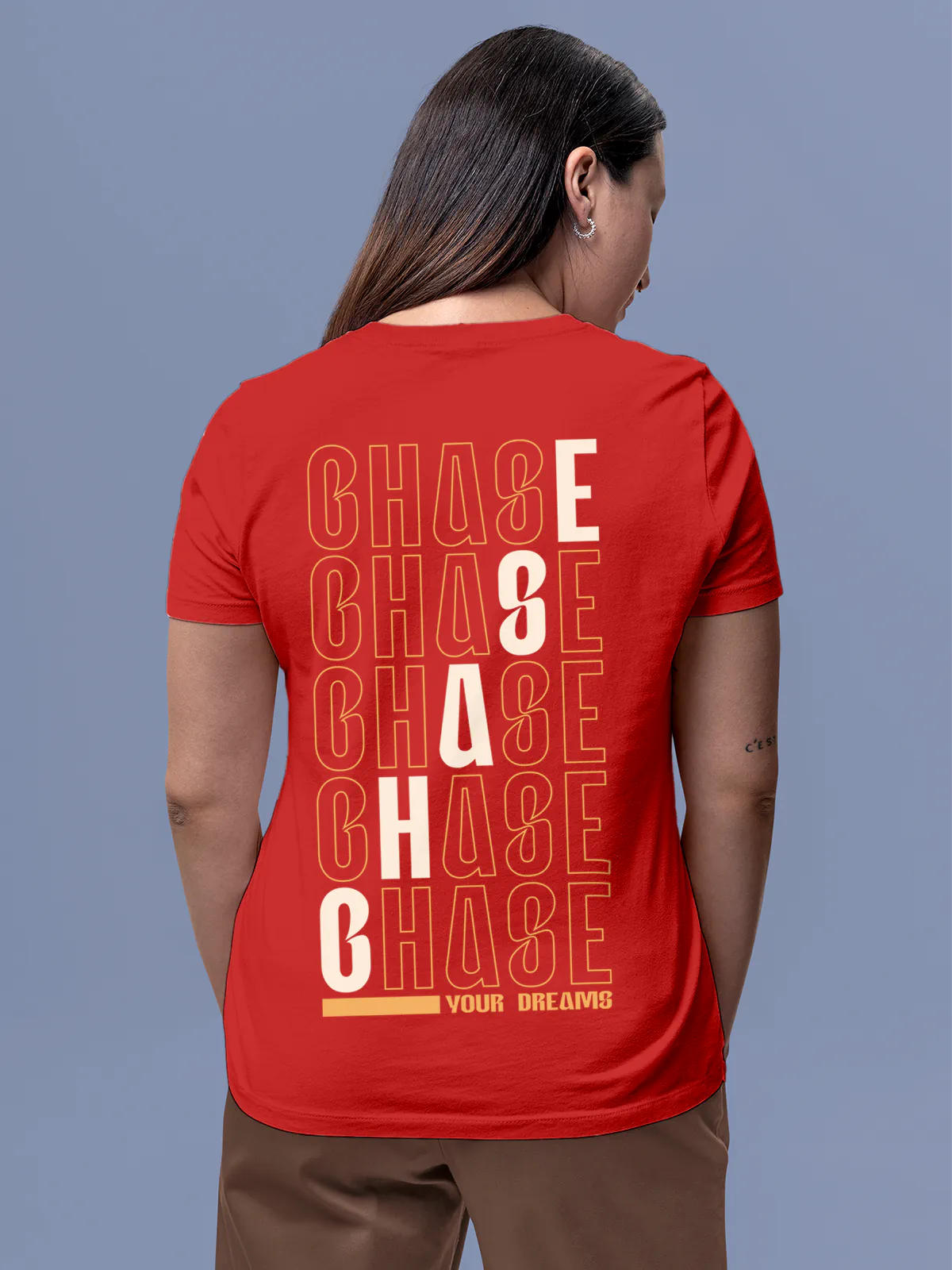 Model wearing Women's Red Round Neck T-shirt with 'Chase Your Dreams' design, offering effortless style and premium comfort