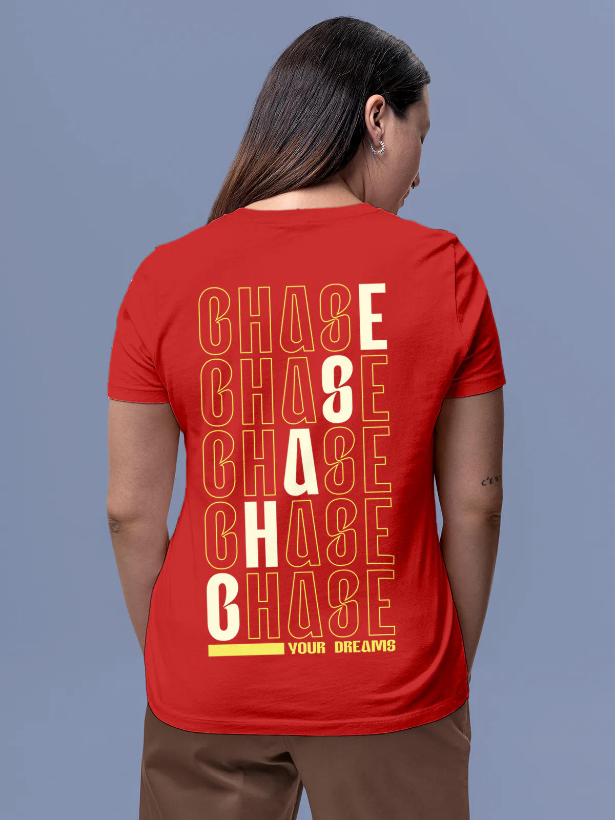 Model wearing Women's Red Round Neck T-shirt with 'Chase Your Dreams' design, offering effortless style and premium comfort