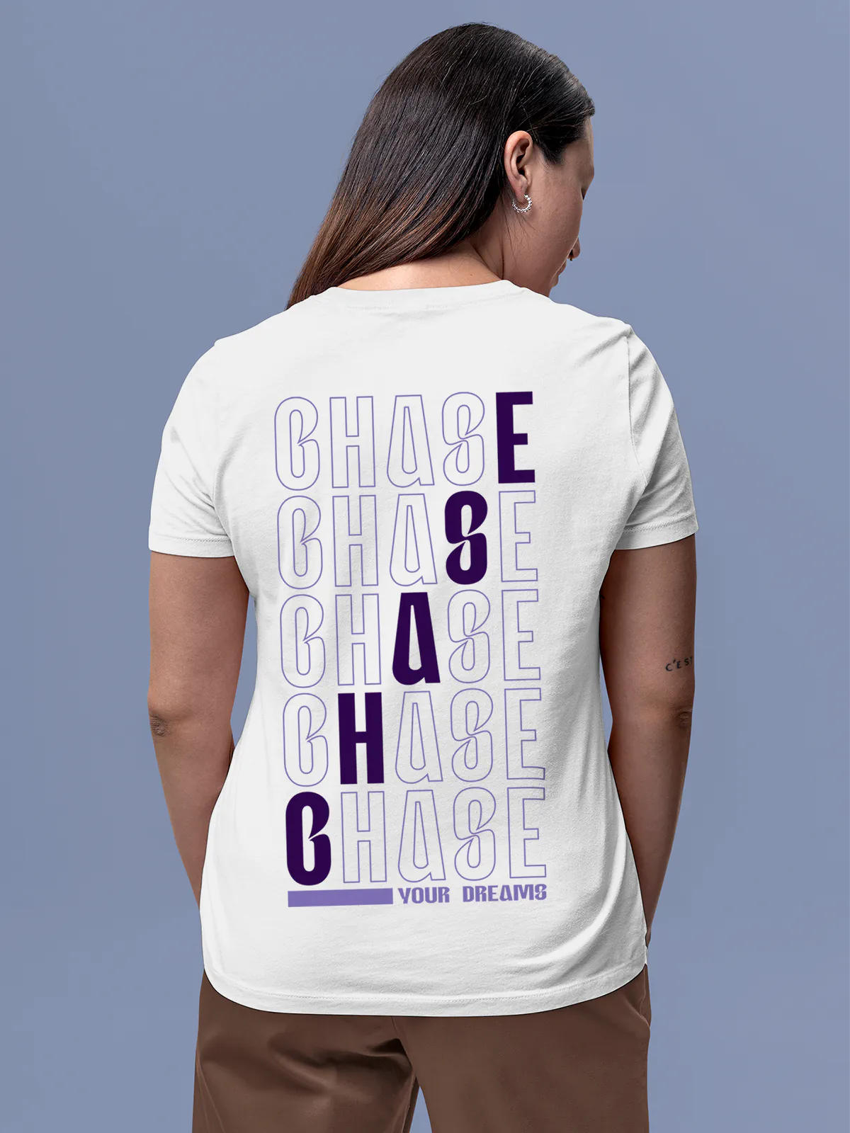 Model wearing Women's White Round Neck T-shirt with 'Chase Your Dreams' design, offering effortless style and premium comfort