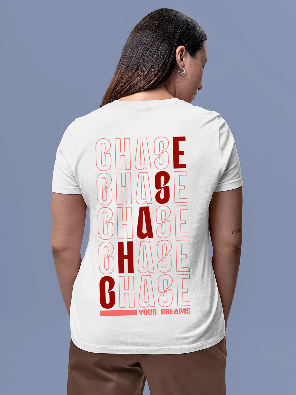 Model wearing Women's White Round Neck T-shirt with 'Chase Your Dreams' design, offering effortless style and premium comfort