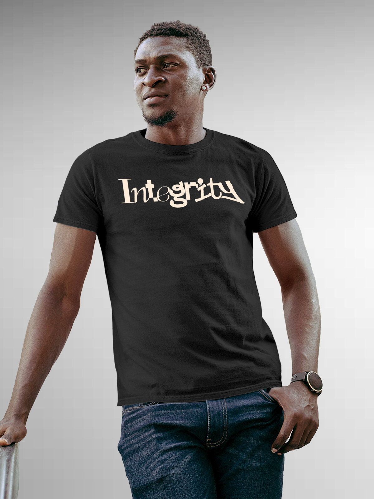 Model wearing Men's Dark Grey Round Neck T-shirt with 'Integrity' design, offering effortless style and premium comfort