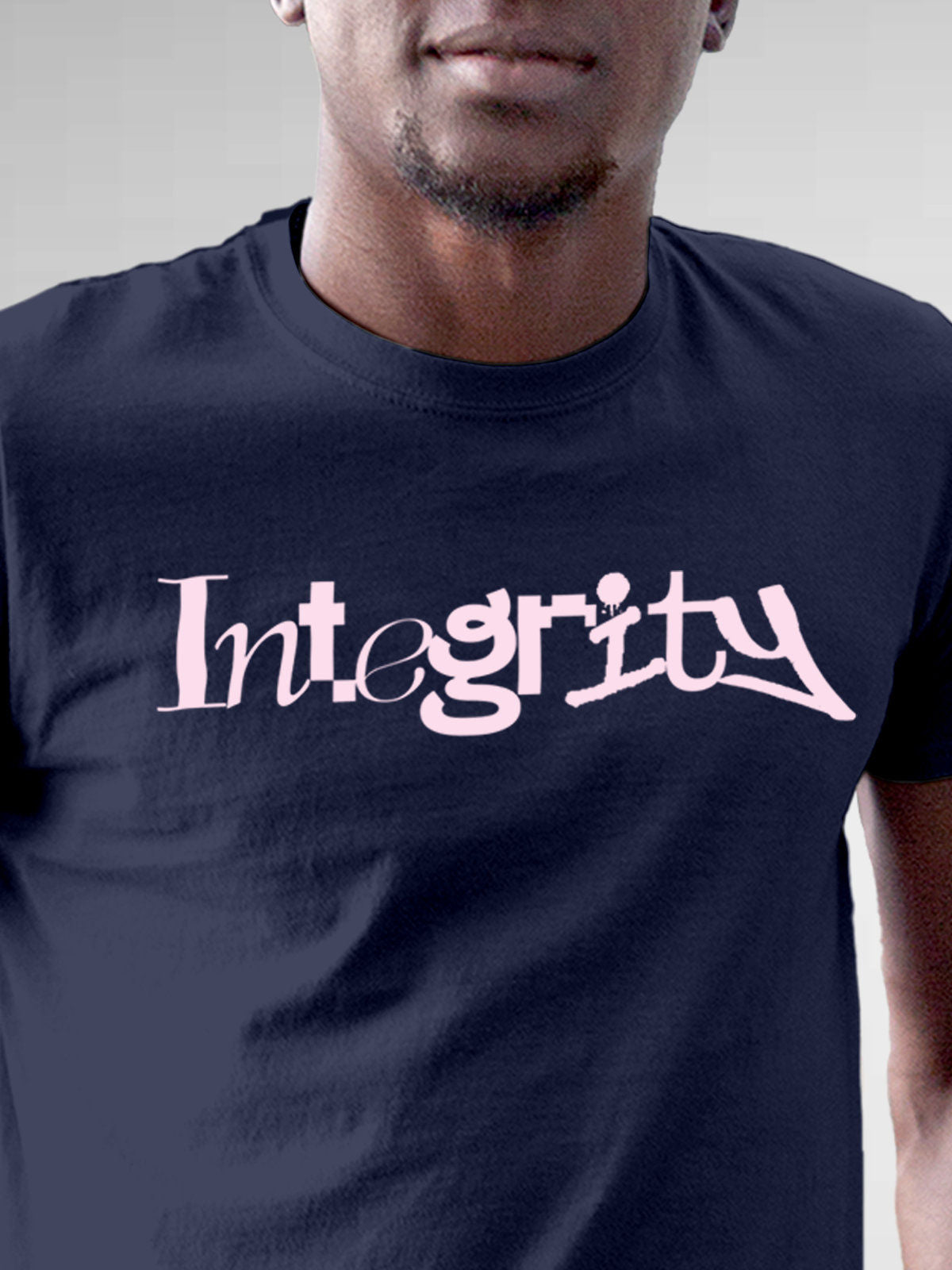 Close up of 'Integrity' design on Men's Navy Blue Round Neck T-shirt, highlighting intricate details and vibrant print.