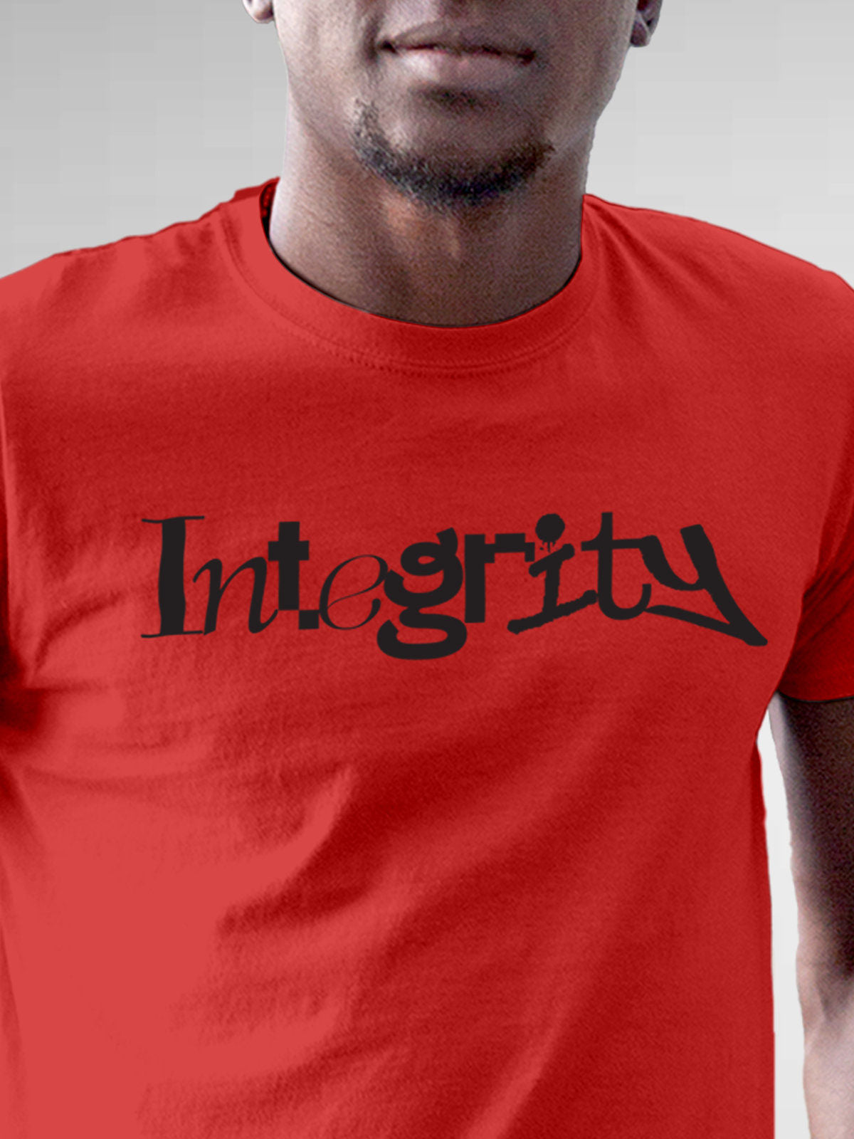 Close up of 'Integrity' design on Men's Red Round Neck T-shirt, highlighting intricate details and vibrant print.