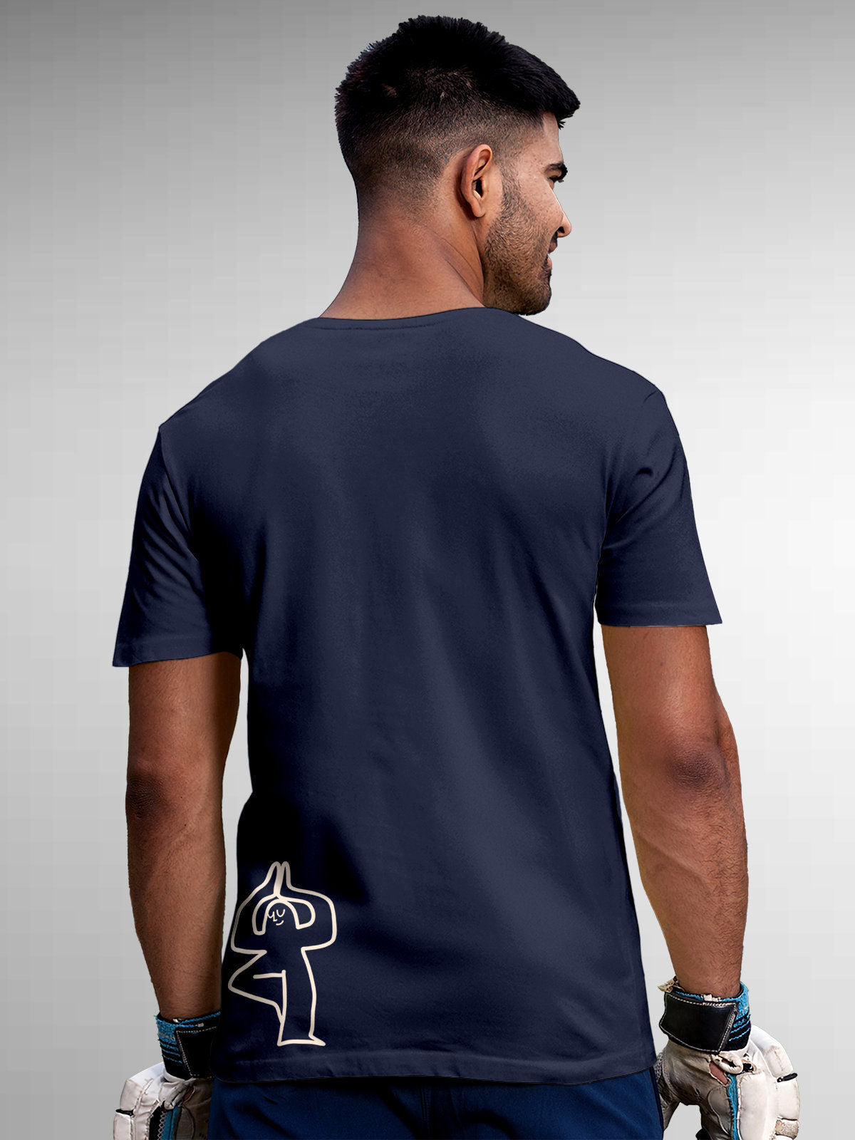 Model wearing Men's Navy Blue Round Neck T-shirt with 'Balance Is A Decision' design, offering effortless style and premium comfort