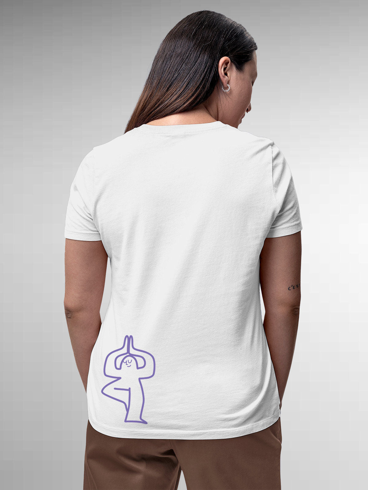 Model wearing Women's White Round Neck T-shirt with 'Balance Is A Decision' design, offering effortless style and premium comfort