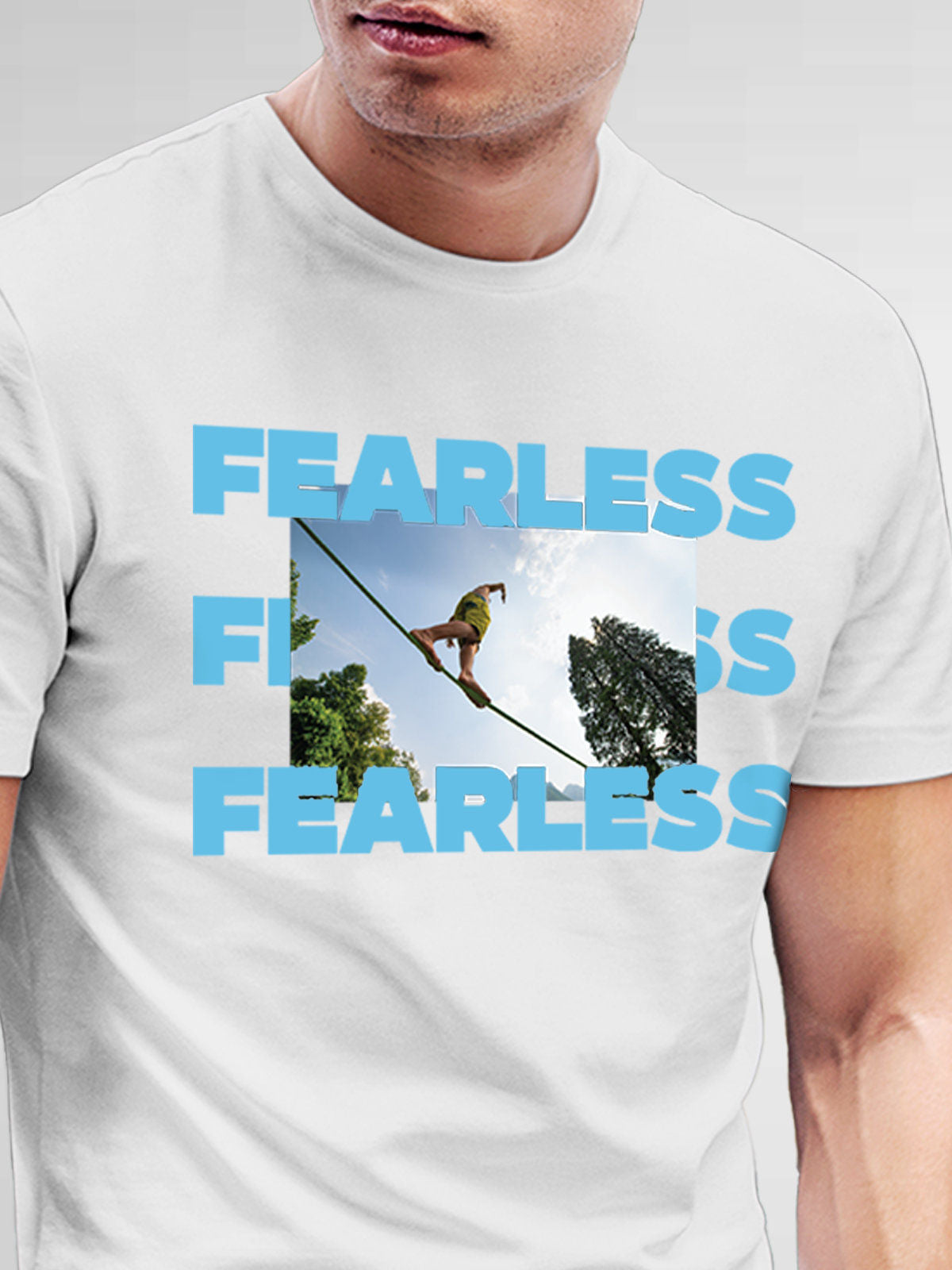 Close up of 'Fearless' design on Men's White Round Neck T-shirt, highlighting intricate details and vibrant print.