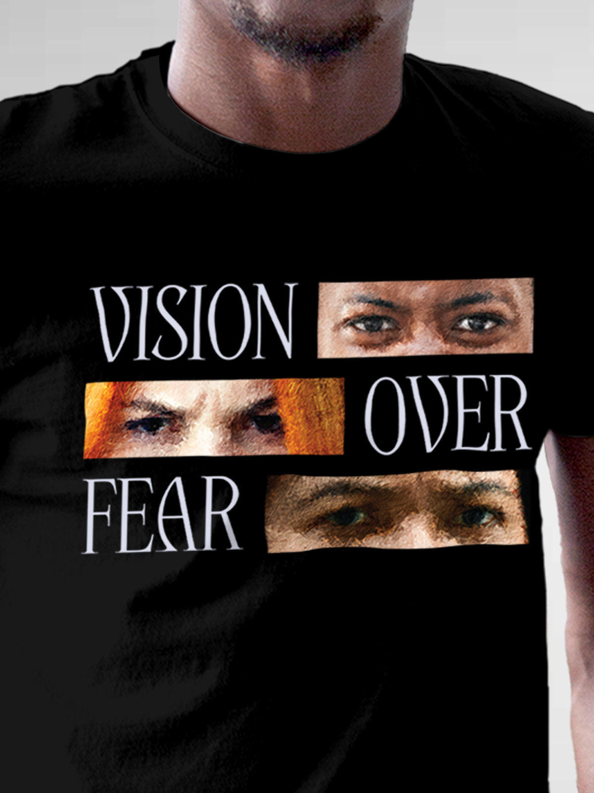Close up of 'Vision Over Fear' design on Men's Black Round Neck T-shirt, highlighting intricate details and vibrant print.