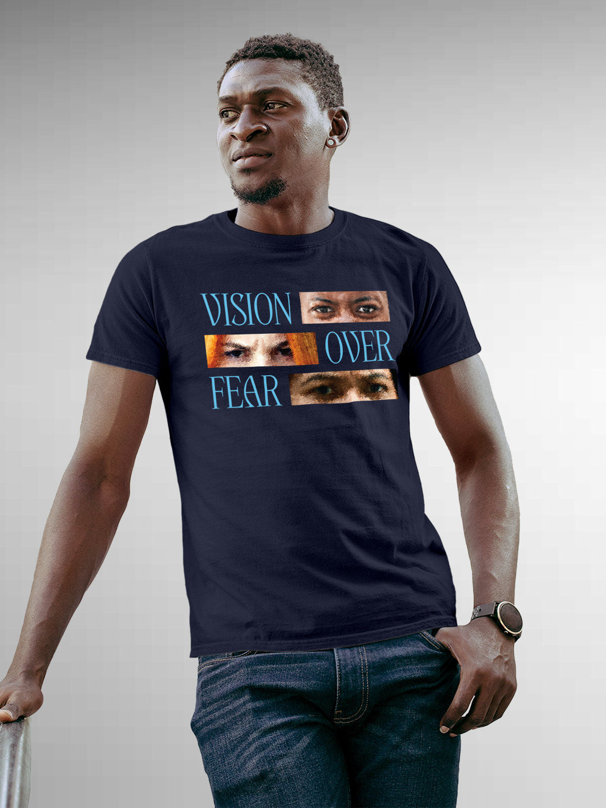 Model wearing Men's Navy Blue Round Neck T-shirt with 'Vision Over Fear' design, offering effortless style and premium comfort