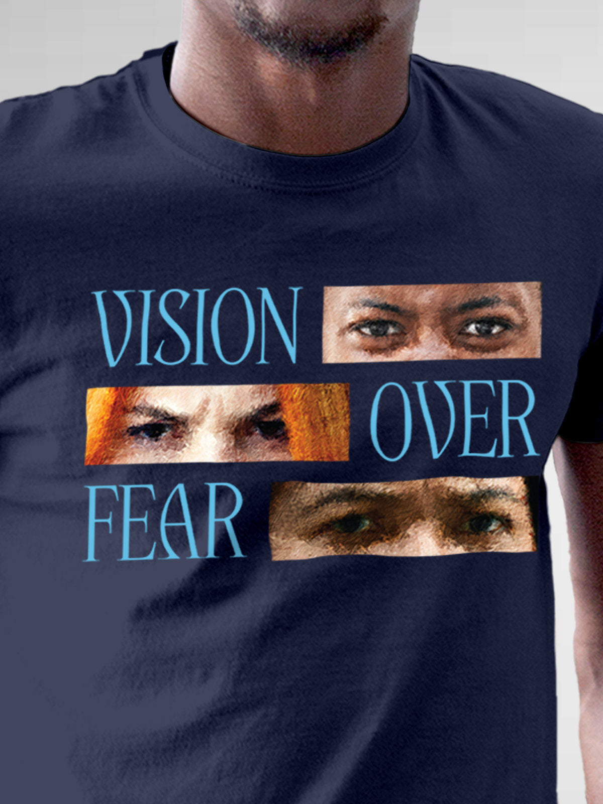 Close up of 'Vision Over Fear' design on Men's Navy Blue Round Neck T-shirt, highlighting intricate details and vibrant print.