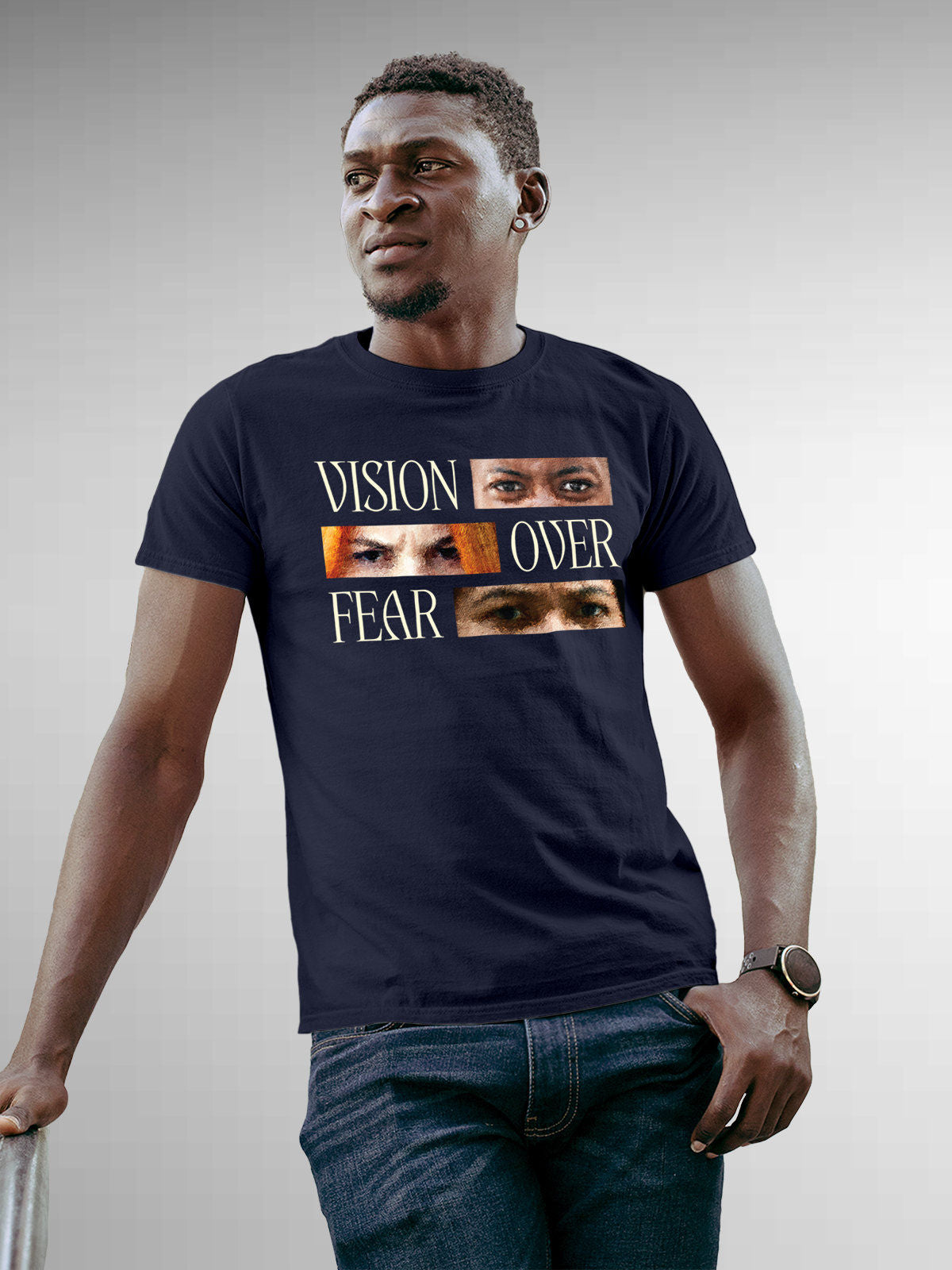 Model wearing Men's Navy Blue Round Neck T-shirt with 'Vision Over Fear' design, offering effortless style and premium comfort