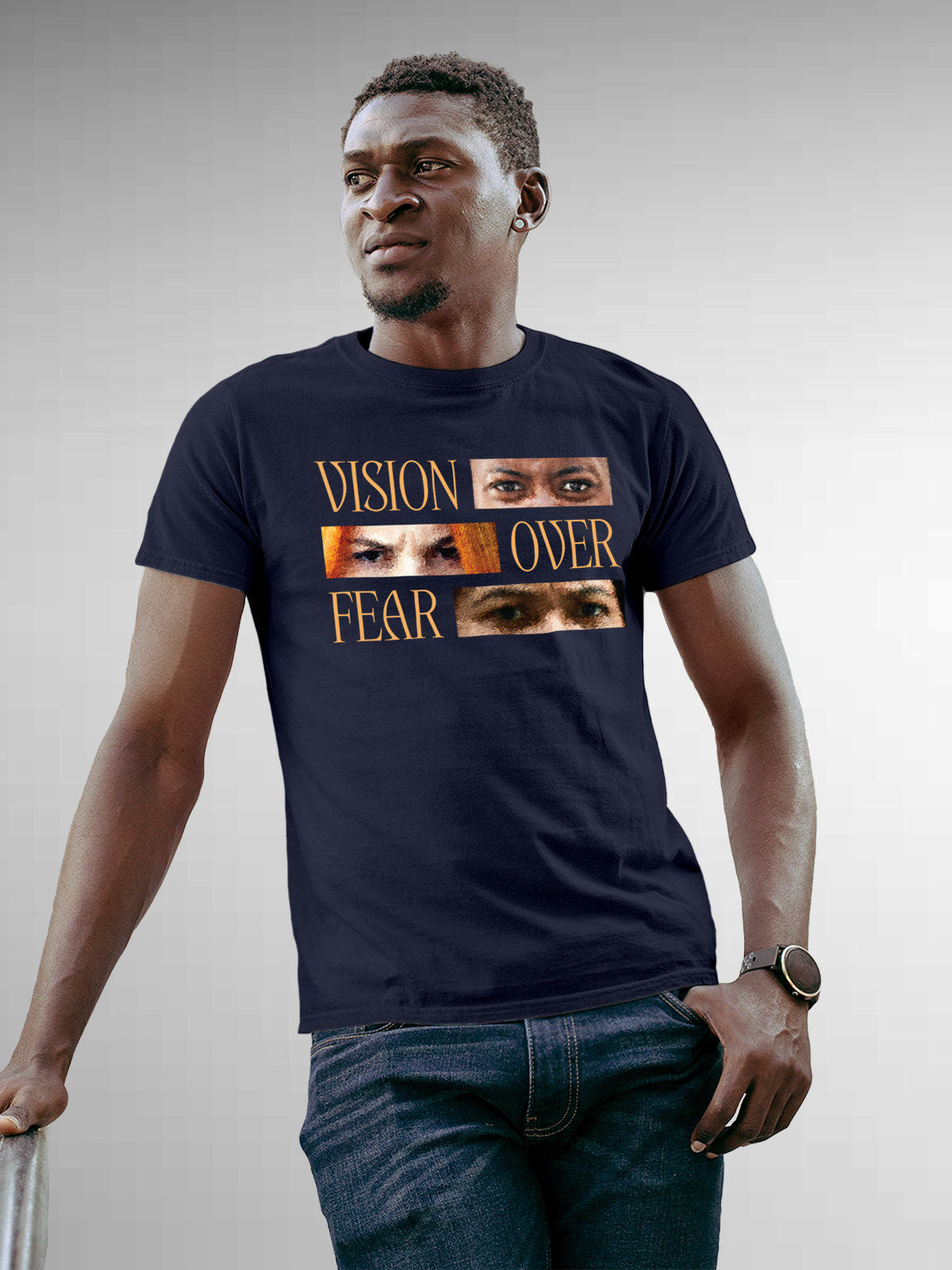 Model wearing Men's Navy Blue Round Neck T-shirt with 'Vision Over Fear' design, offering effortless style and premium comfort