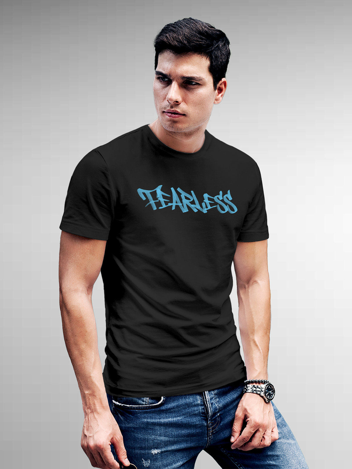 Model wearing Men's Dark Grey Round Neck T-shirt with 'Fearless' design, offering effortless style and premium comfort