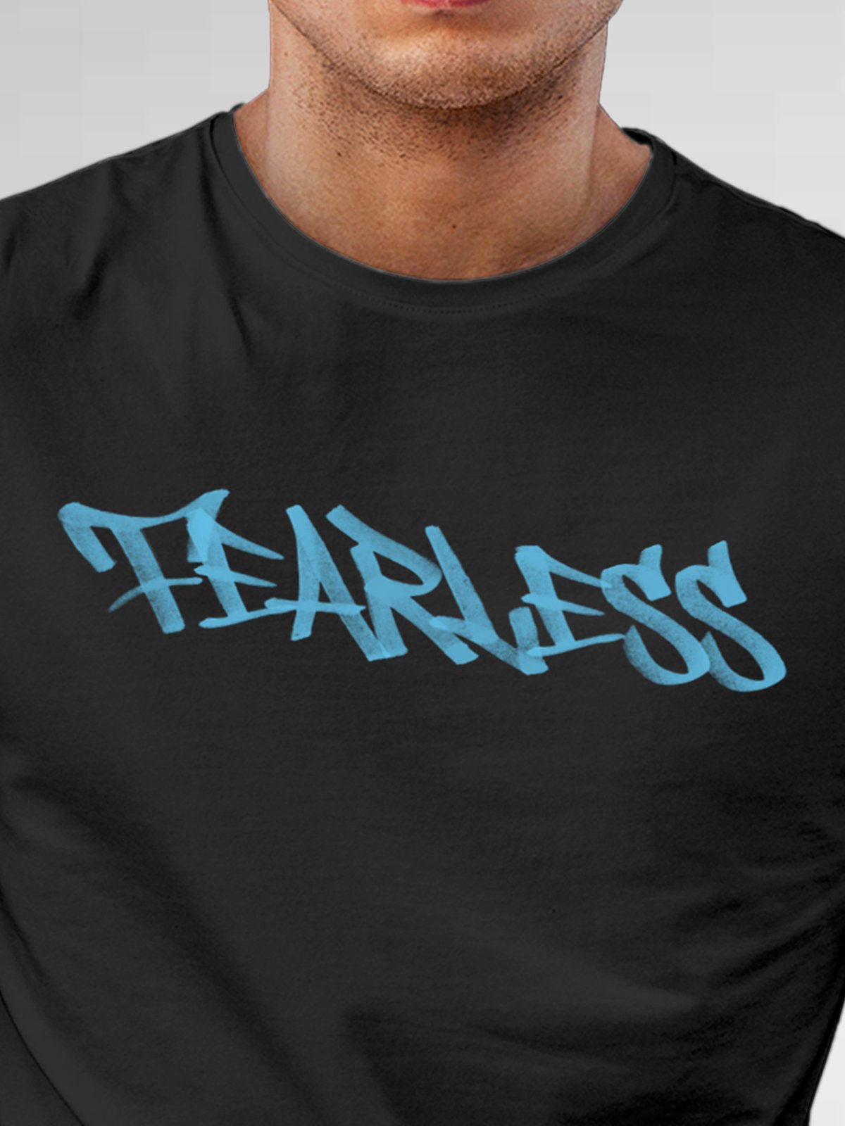 Close up of 'Fearless' design on Men's Dark Grey Round Neck T-shirt, highlighting intricate details and vibrant print.