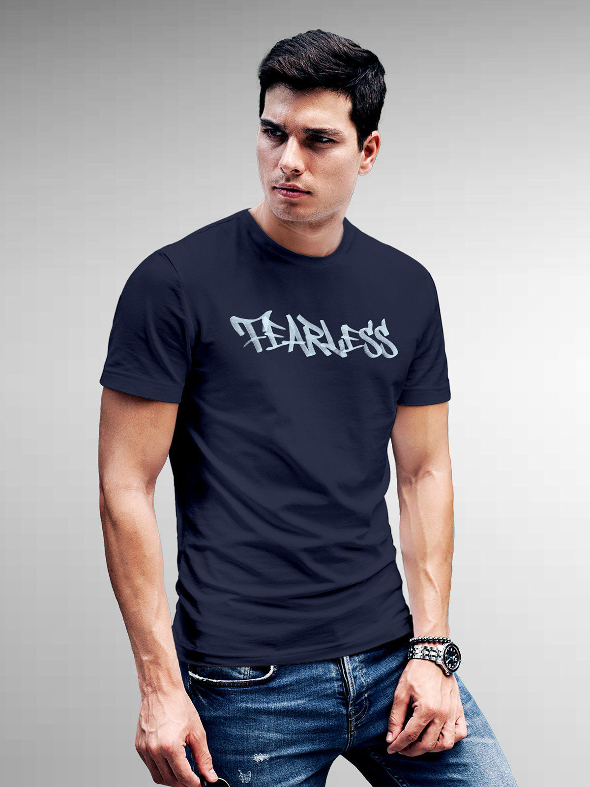 Model wearing Men's Navy Blue Round Neck T-shirt with 'Fearless' design, offering effortless style and premium comfort