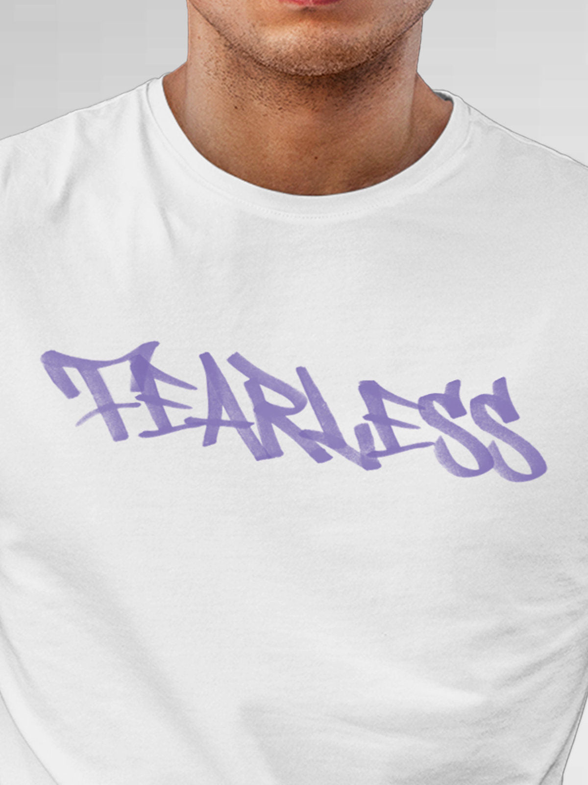 Close up of 'Fearless' design on Men's White Round Neck T-shirt, highlighting intricate details and vibrant print.