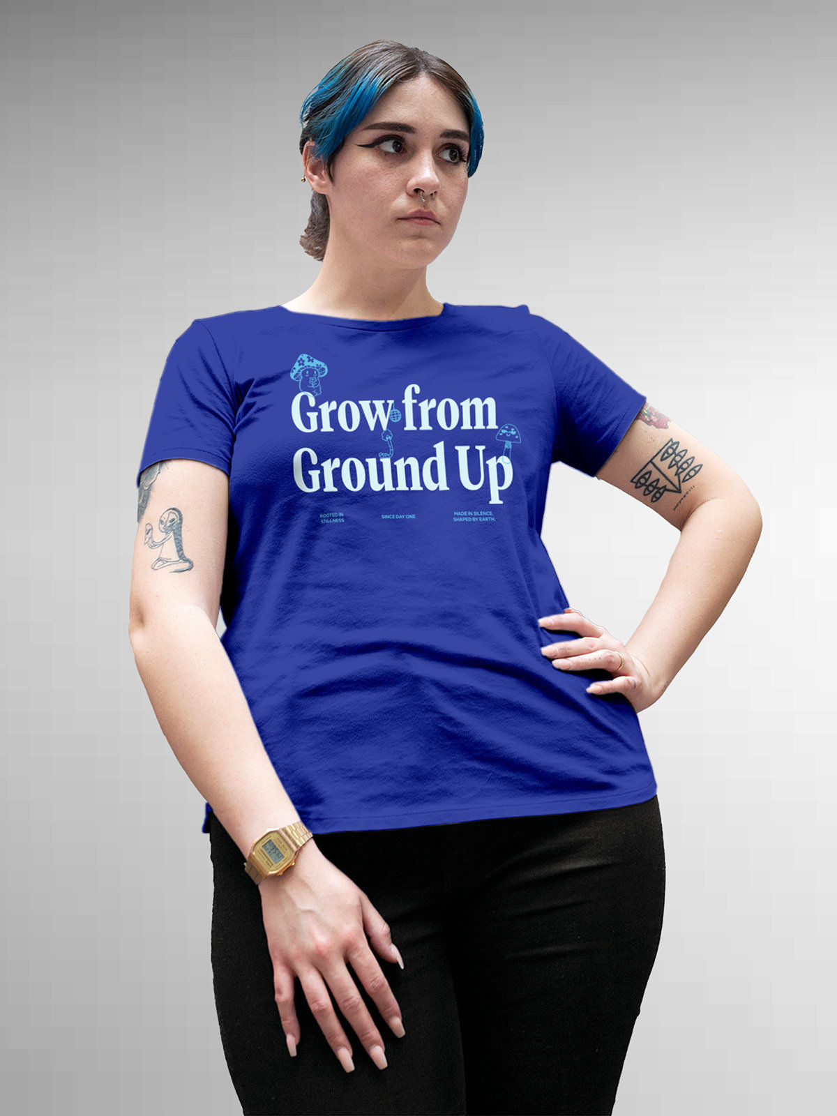 Model wearing Women's Blue Round Neck T-shirt with 'Grow From Ground Up' design, offering effortless style and premium comfort