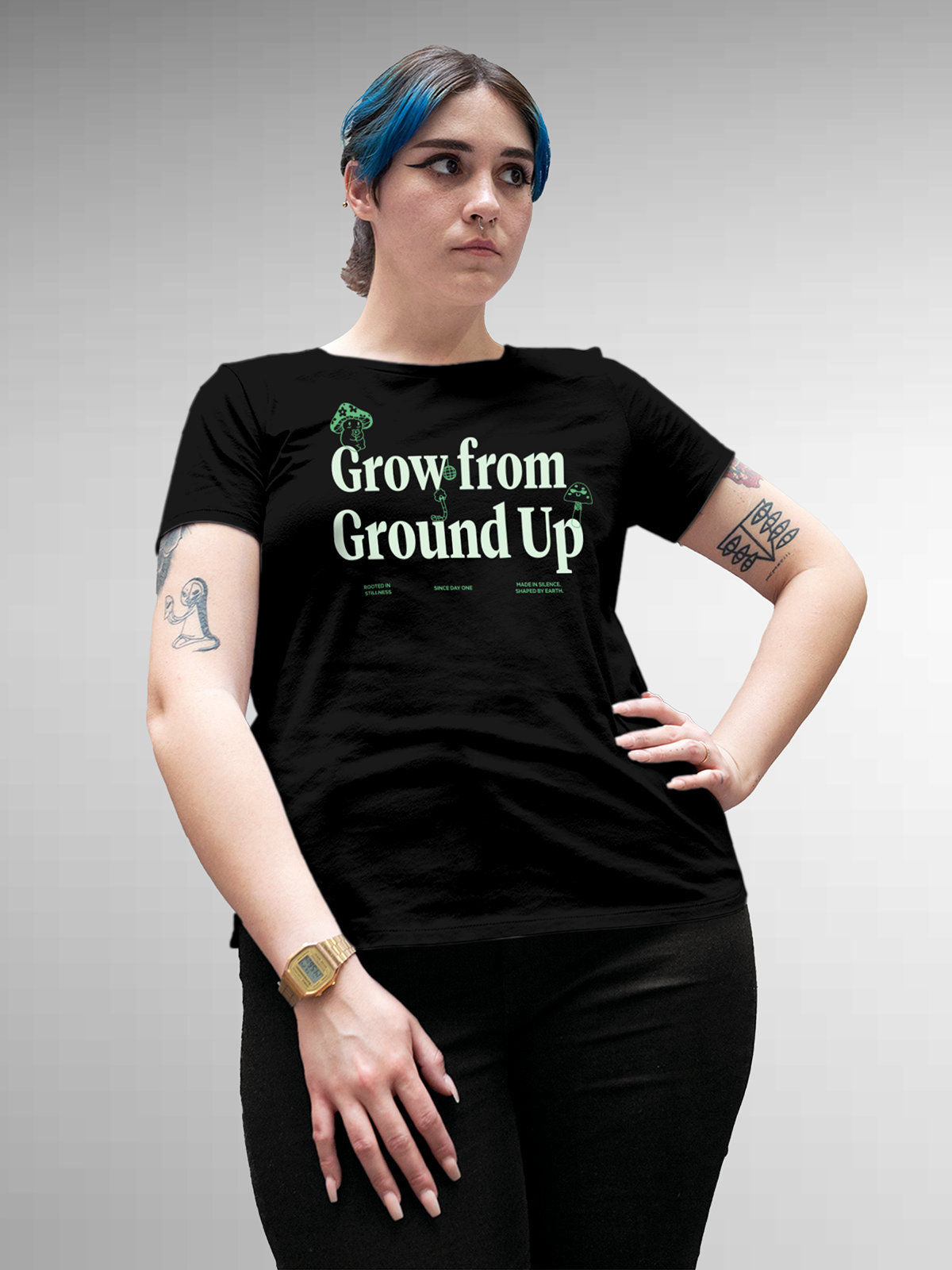 Model wearing Women's Black Round Neck T-shirt with 'Grow From Ground Up' design, offering effortless style and premium comfort