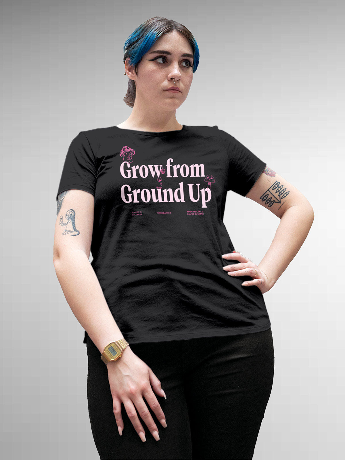 Model wearing Women's Dark Grey Round Neck T-shirt with 'Grow From Ground Up' design, offering effortless style and premium comfort