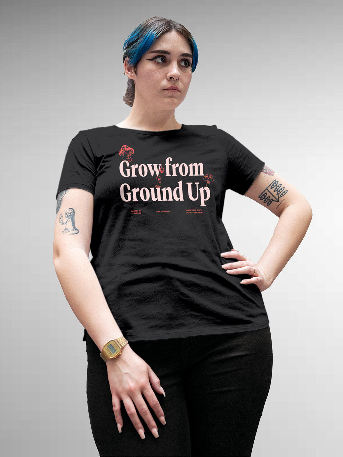 Model wearing Women's Dark Grey Round Neck T-shirt with 'Grow From Ground Up' design, offering effortless style and premium comfort