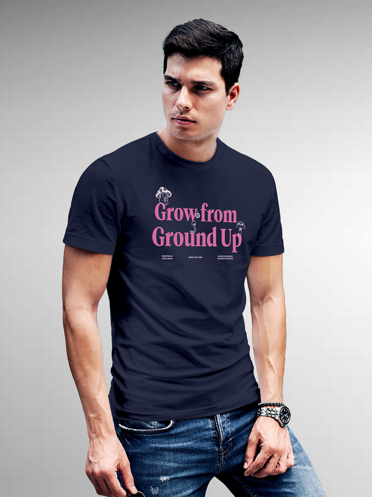 Model wearing Men's Navy Blue Round Neck T-shirt with 'Grow From Ground Up' design, offering effortless style and premium comfort