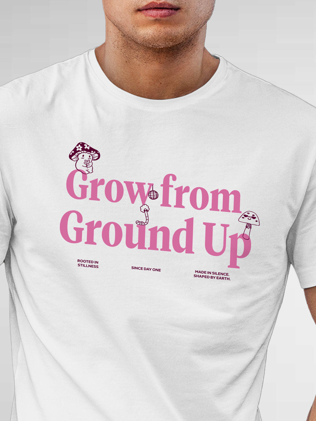 Close up of 'Grow From Ground Up' design on Men's White Round Neck T-shirt, highlighting intricate details and vibrant print.