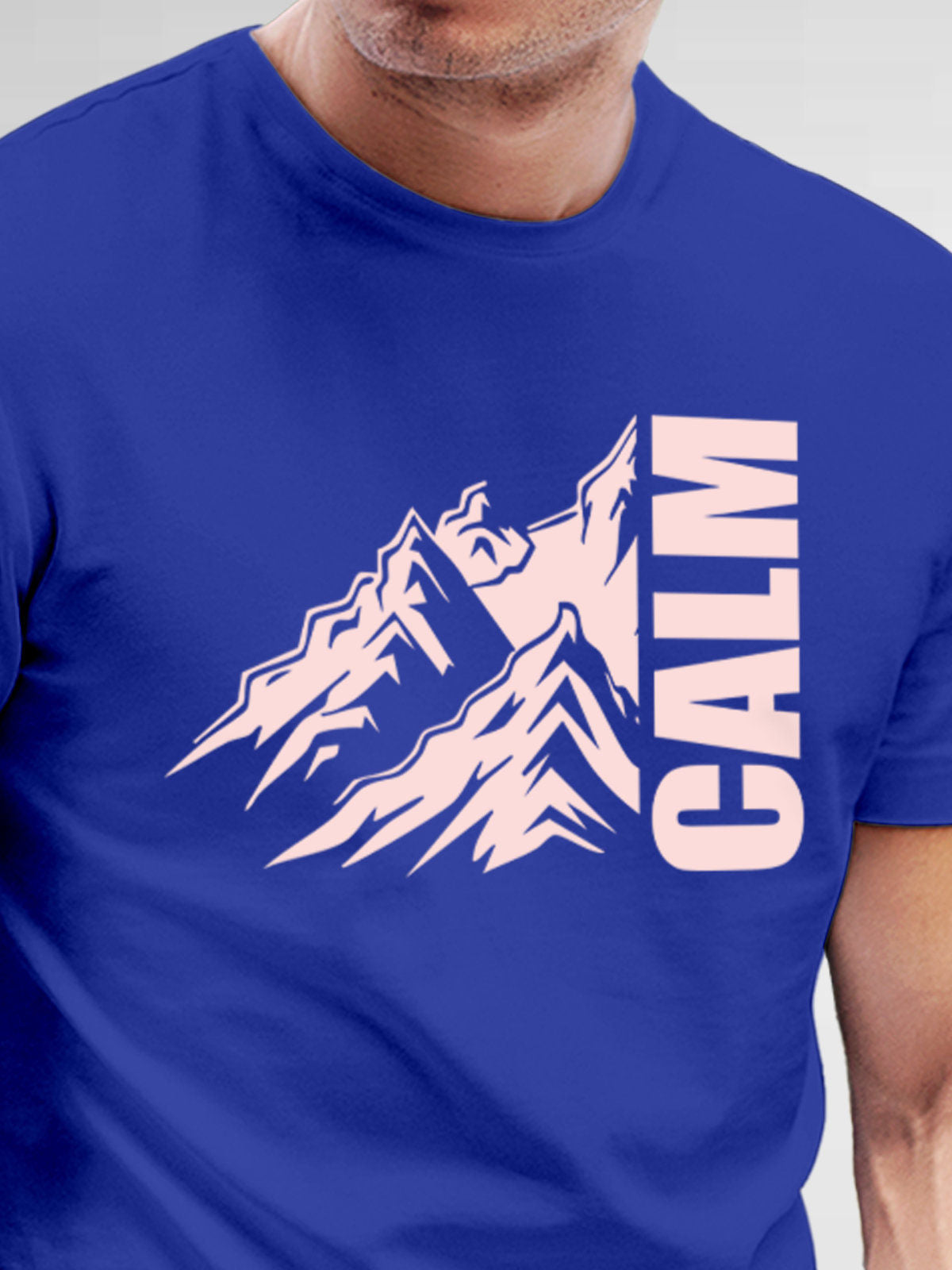 Close up of 'Calm' design on Men's Blue Round Neck T-shirt, highlighting intricate details and vibrant print.