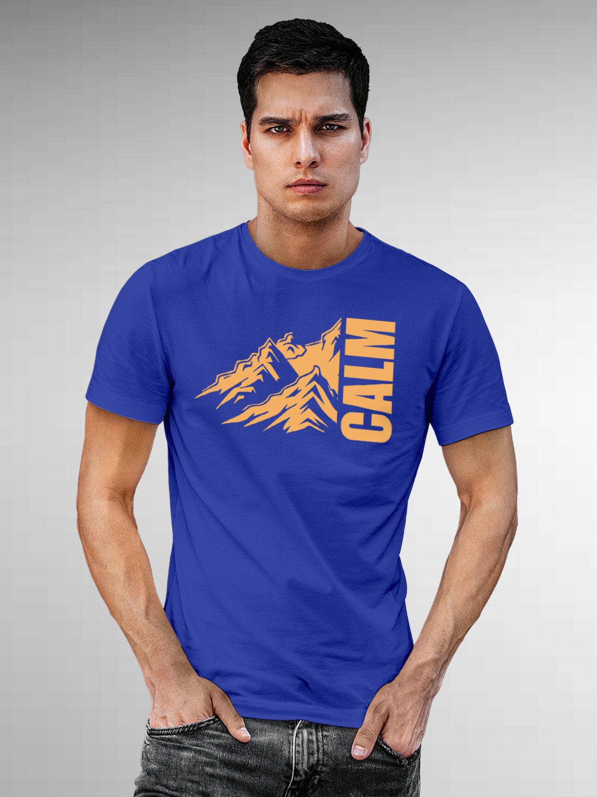 Model wearing Men's Blue Round Neck T-shirt with 'Calm' design, offering effortless style and premium comfort