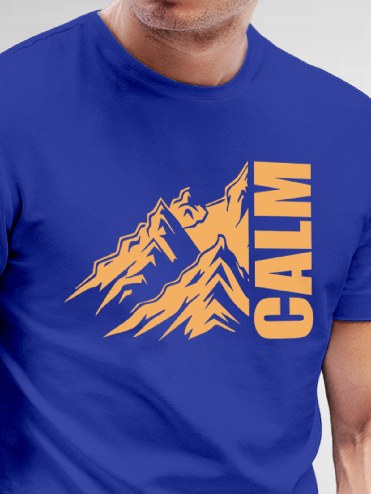 Close up of 'Calm' design on Men's Blue Round Neck T-shirt, highlighting intricate details and vibrant print.