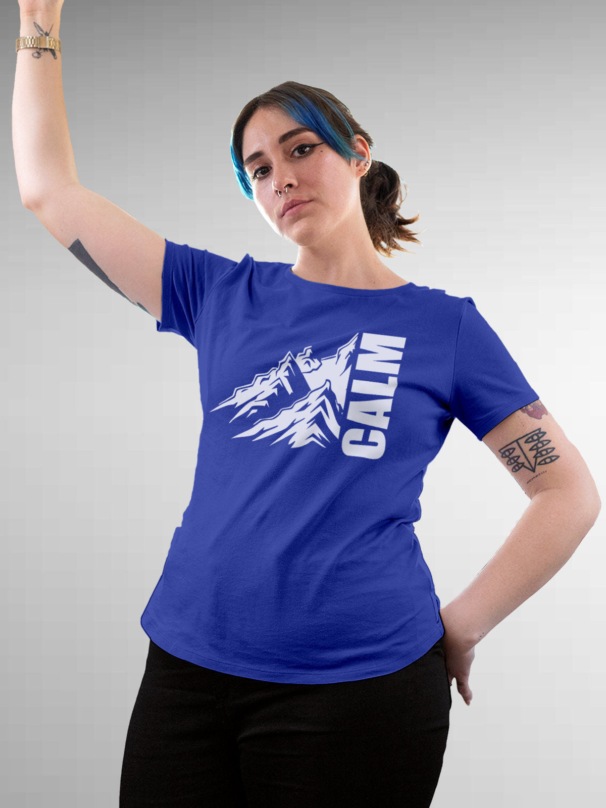 Model wearing Women's Blue Round Neck T-shirt with 'Calm' design, offering effortless style and premium comfort