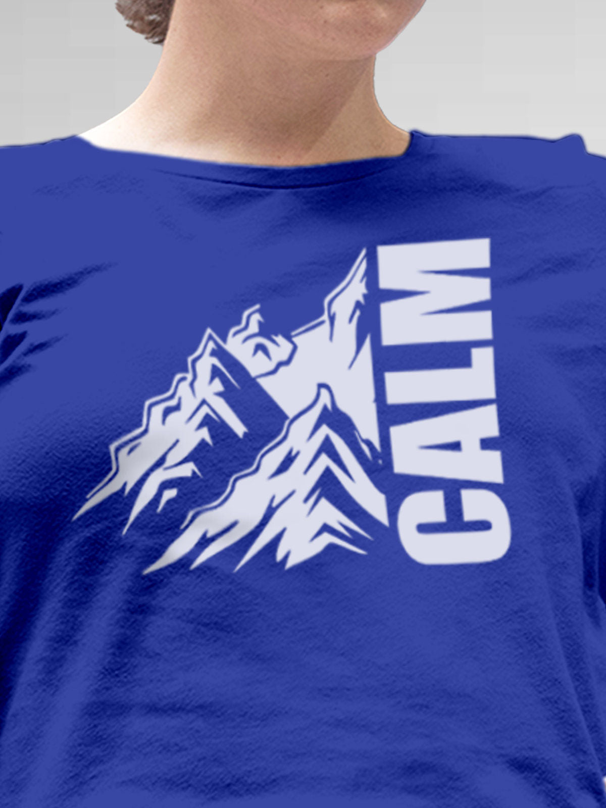 Close up of 'Calm' design on Women's Blue Round Neck T-shirt, highlighting intricate details and vibrant print.