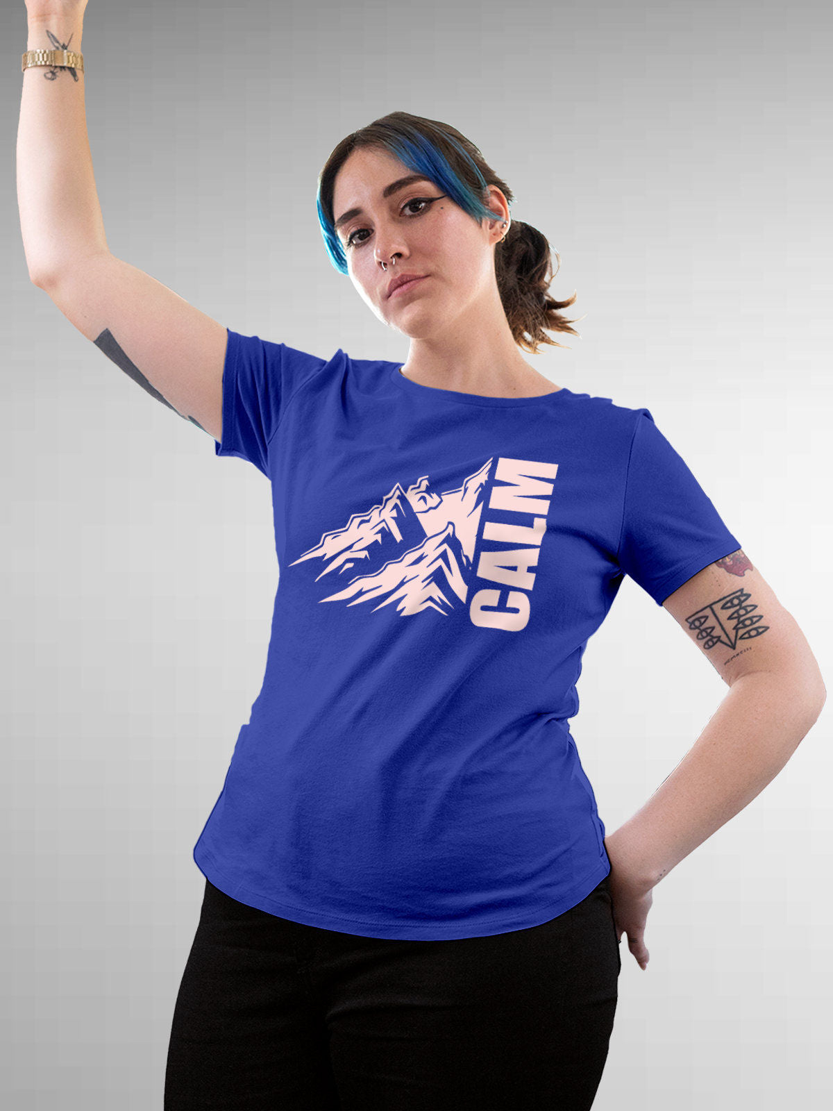 Model wearing Women's Blue Round Neck T-shirt with 'Calm' design, offering effortless style and premium comfort