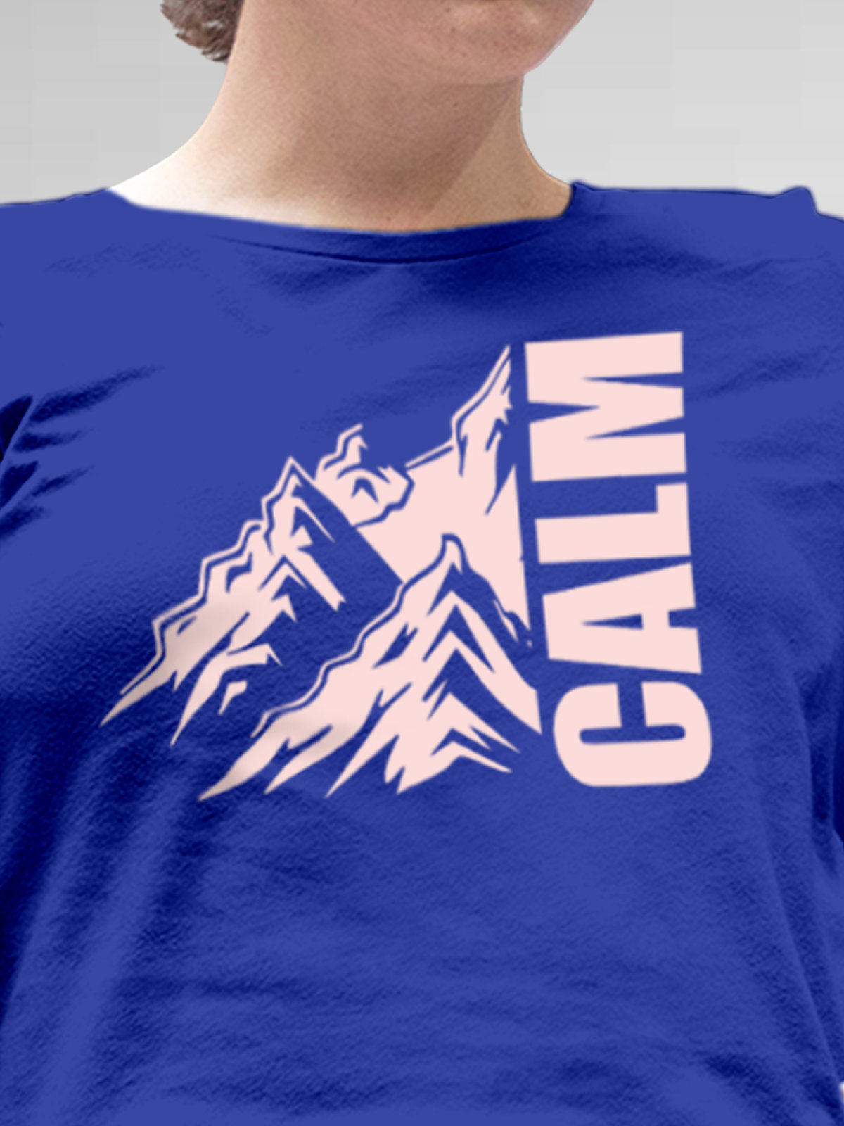 Close up of 'Calm' design on Women's Blue Round Neck T-shirt, highlighting intricate details and vibrant print.