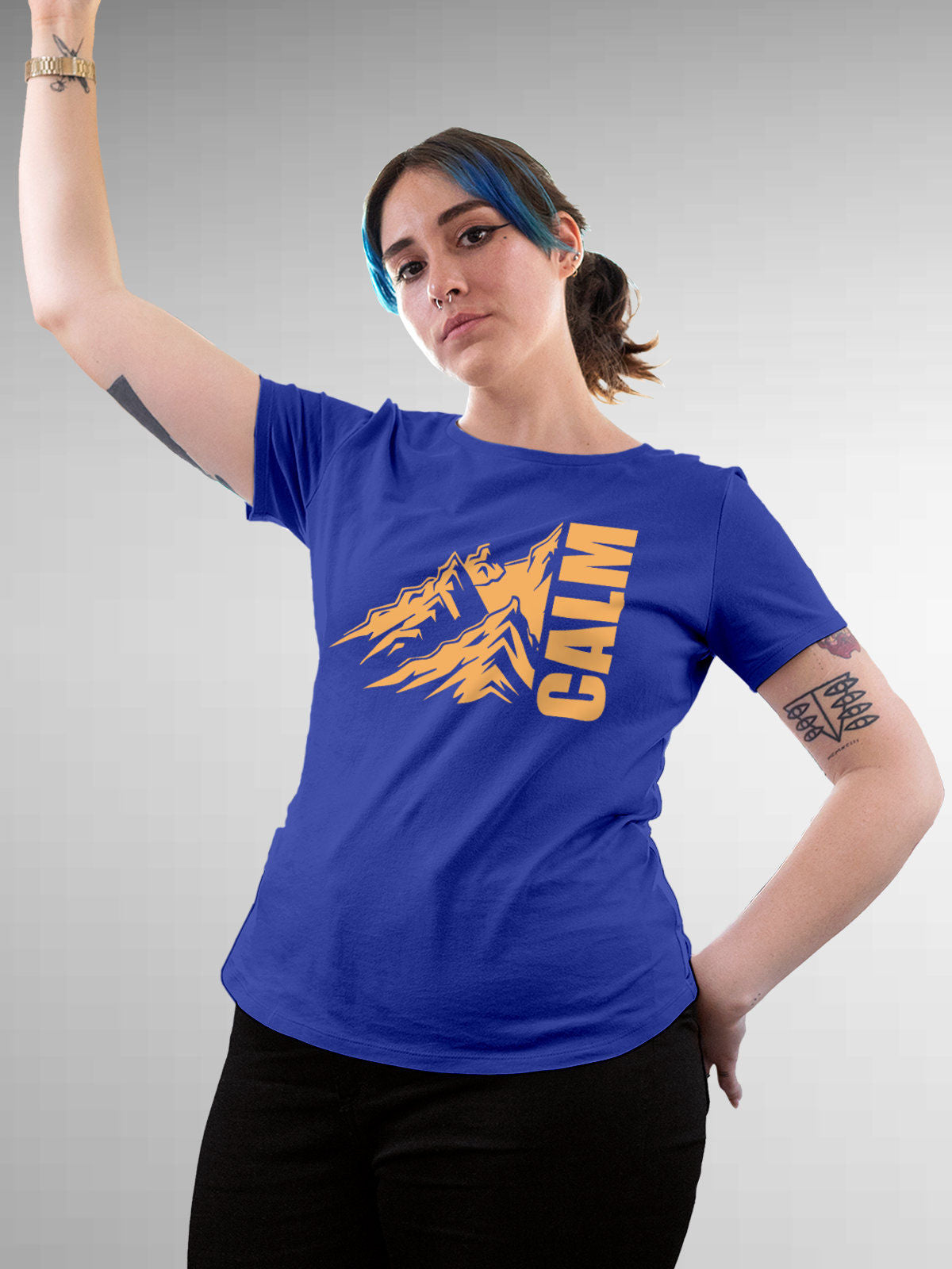 Model wearing Women's Blue Round Neck T-shirt with 'Calm' design, offering effortless style and premium comfort