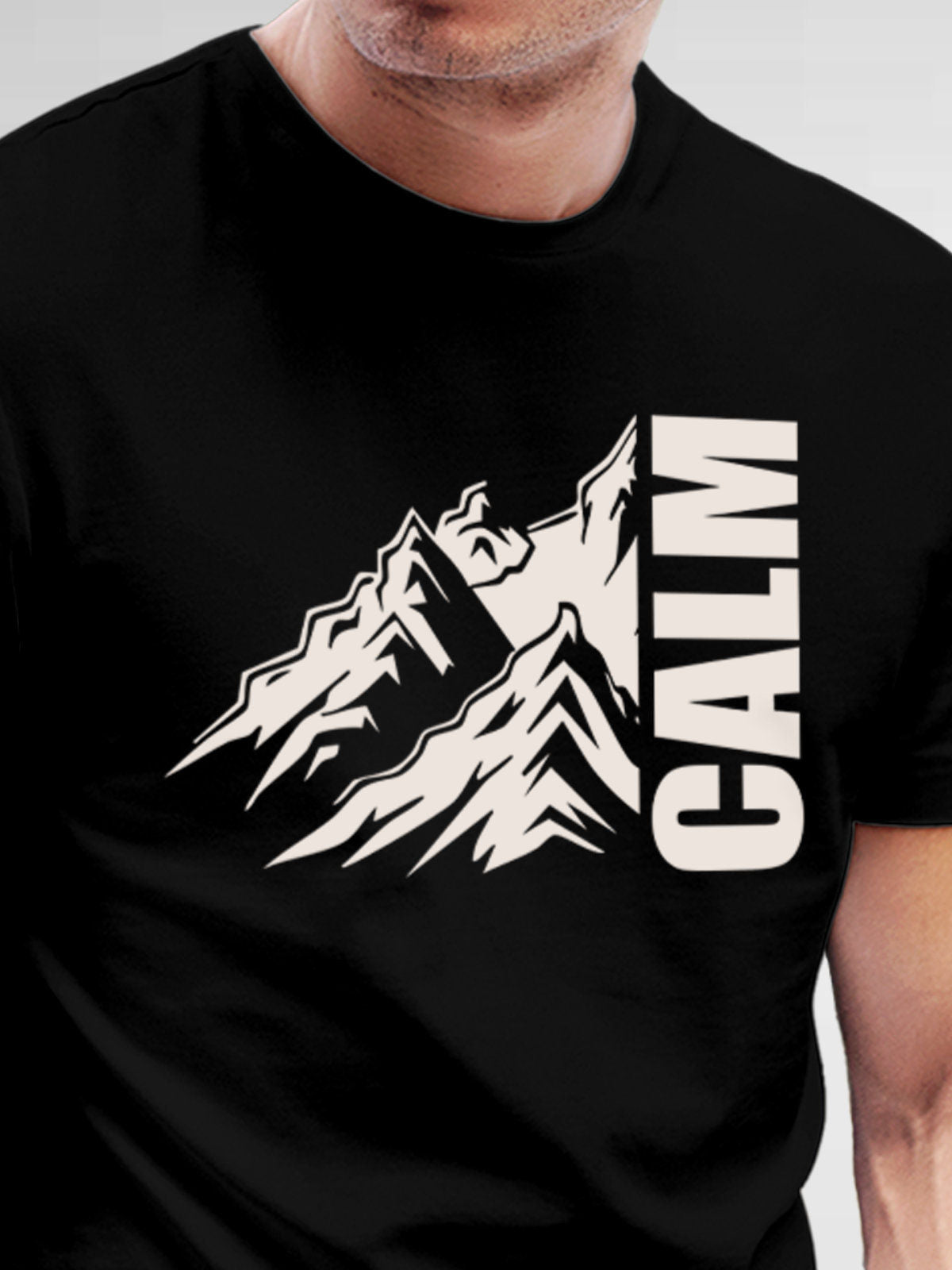 Close up of 'Calm' design on Men's Black Round Neck T-shirt, highlighting intricate details and vibrant print.