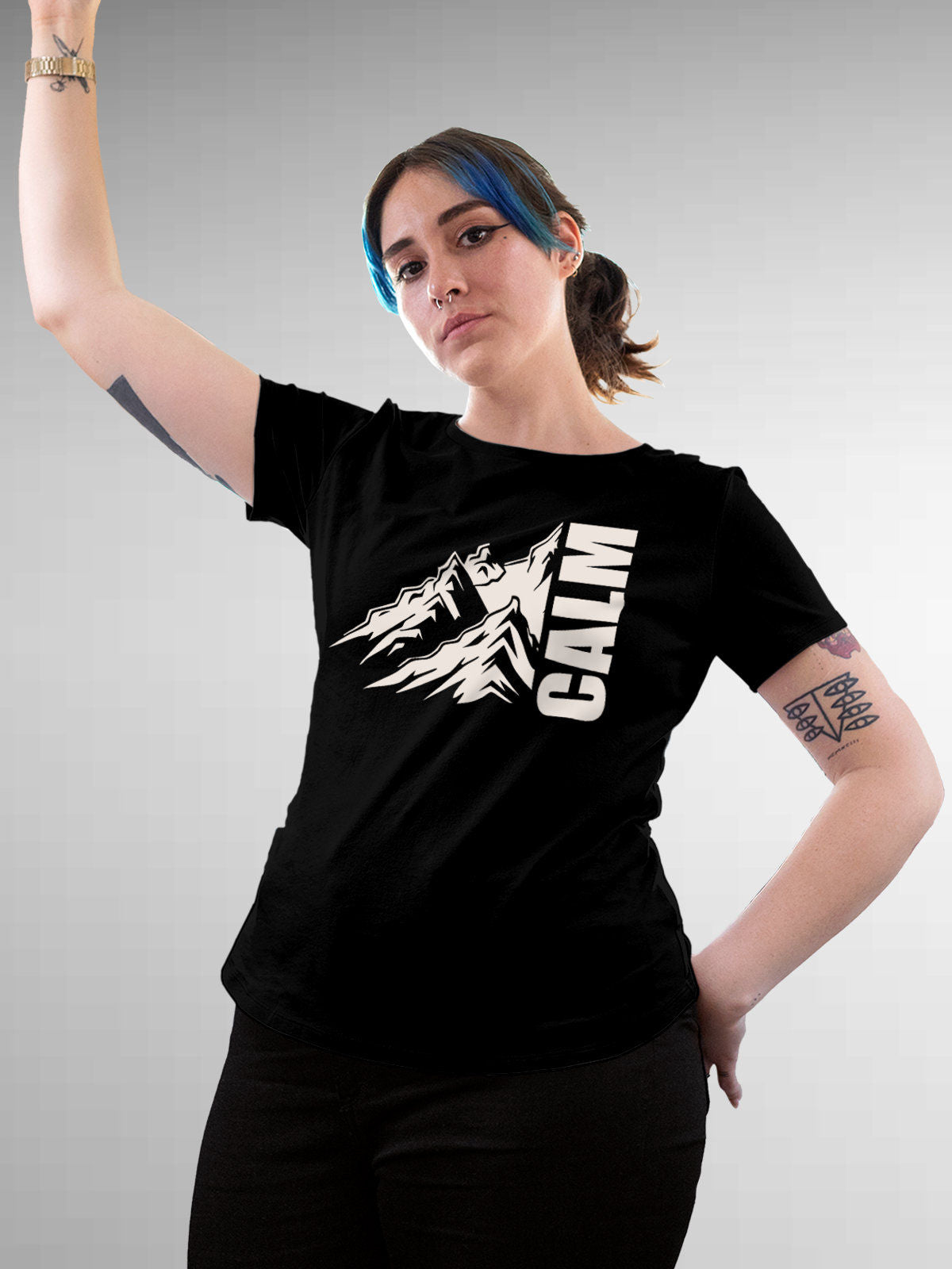 Model wearing Women's Black Round Neck T-shirt with 'Calm' design, offering effortless style and premium comfort