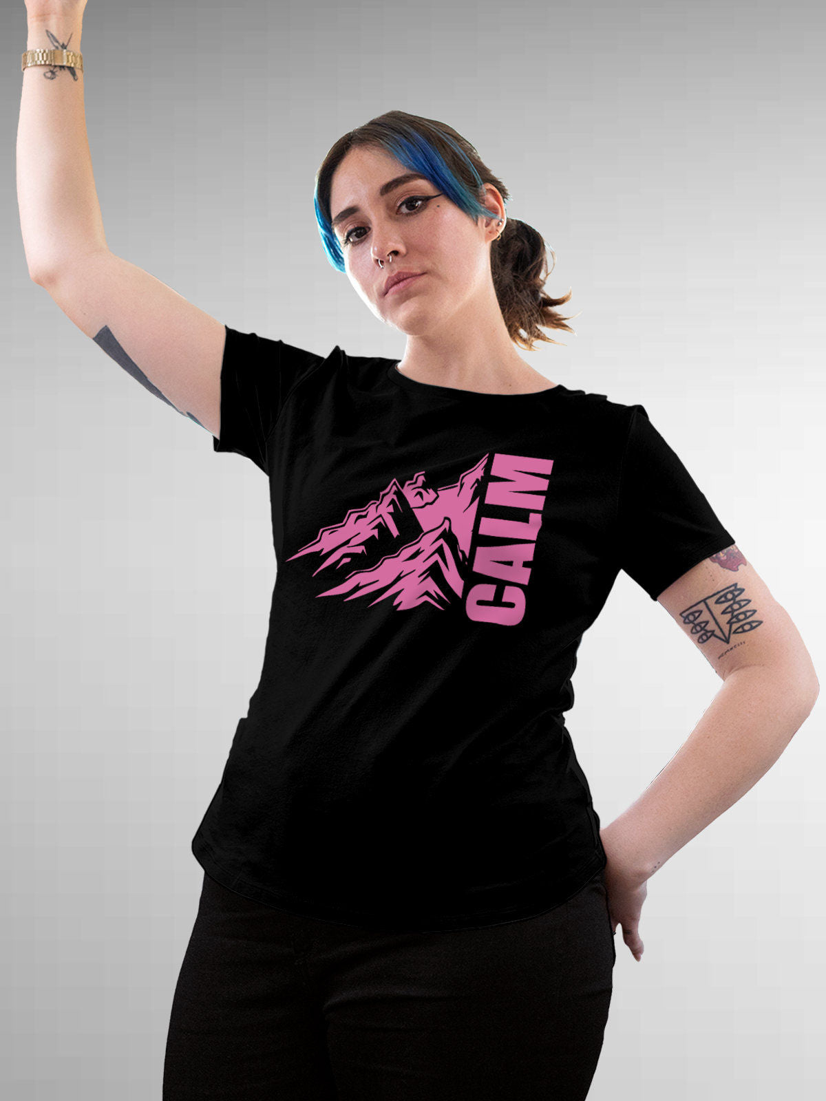 Model wearing Women's Black Round Neck T-shirt with 'Calm' design, offering effortless style and premium comfort