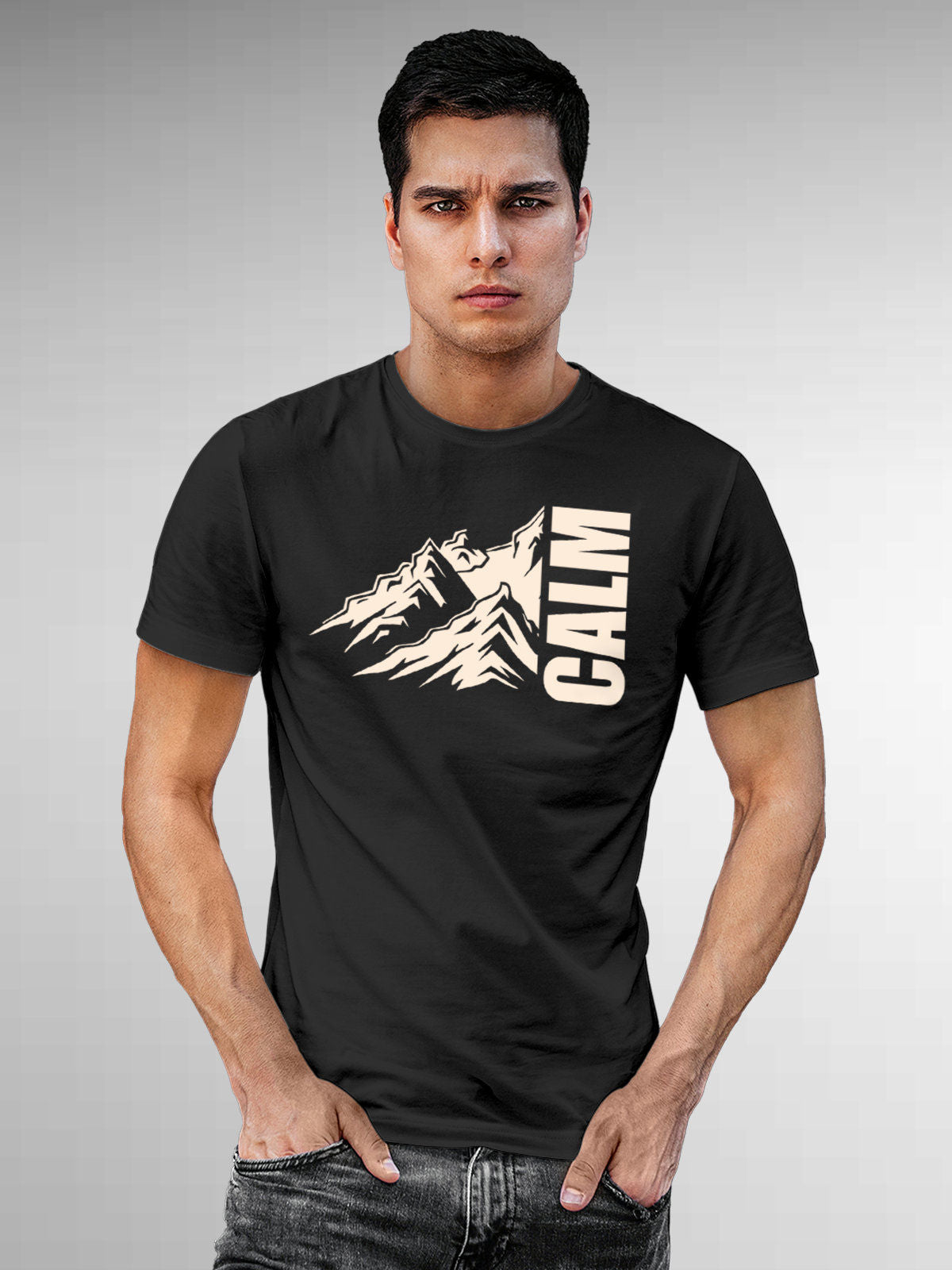 Model wearing Men's Dark Grey Round Neck T-shirt with 'Calm' design, offering effortless style and premium comfort